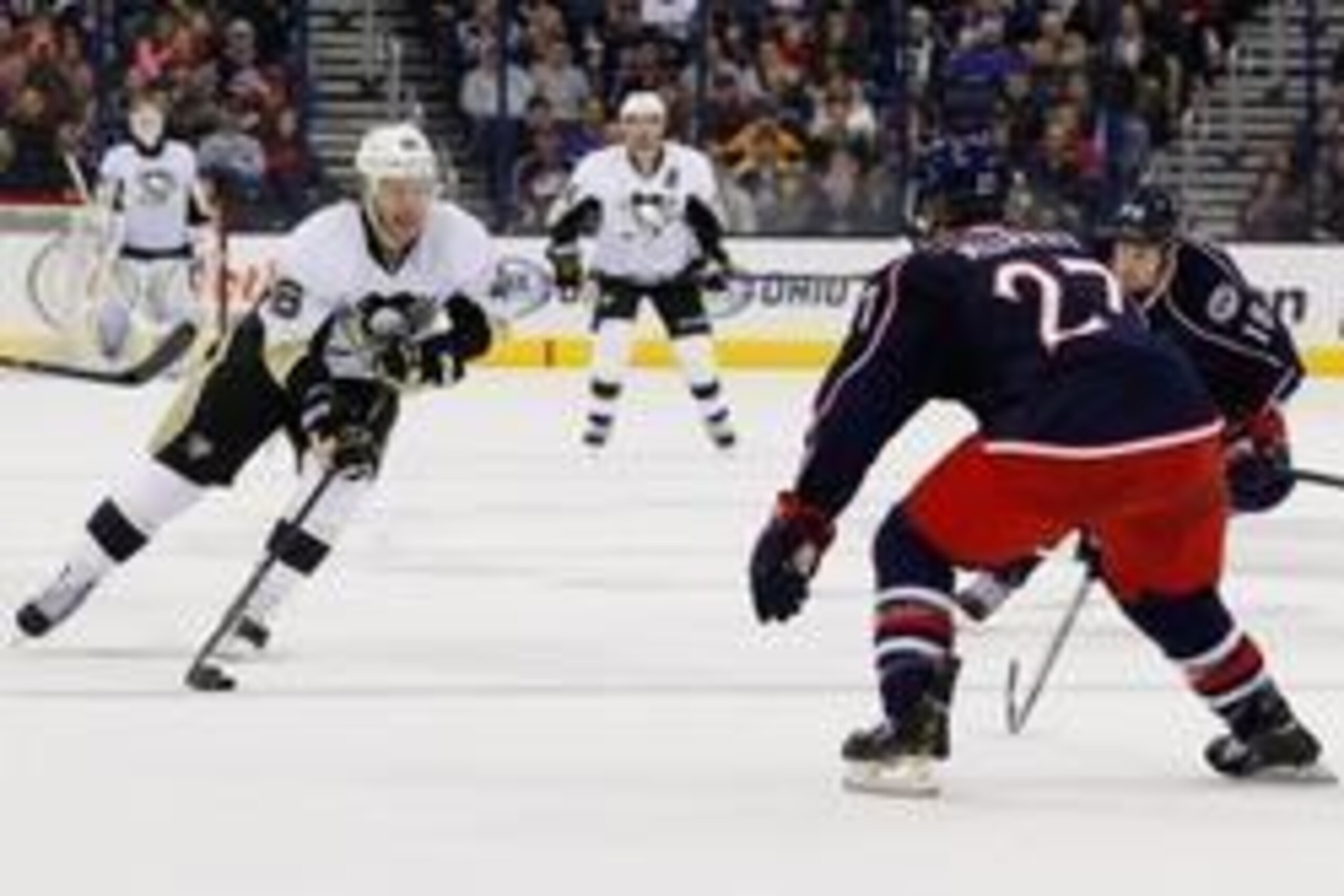 Dec 29, 2013; Columbus, OH, USA; Pittsburgh Penguins center Joe Vitale (46) skates with the puck as Columbus Blue Jackets defenseman Ryan Murray (27) defends during the third period at Nationwide Arena. Pittsburgh won 5-3. Mandatory Credit: Russell LaBoun