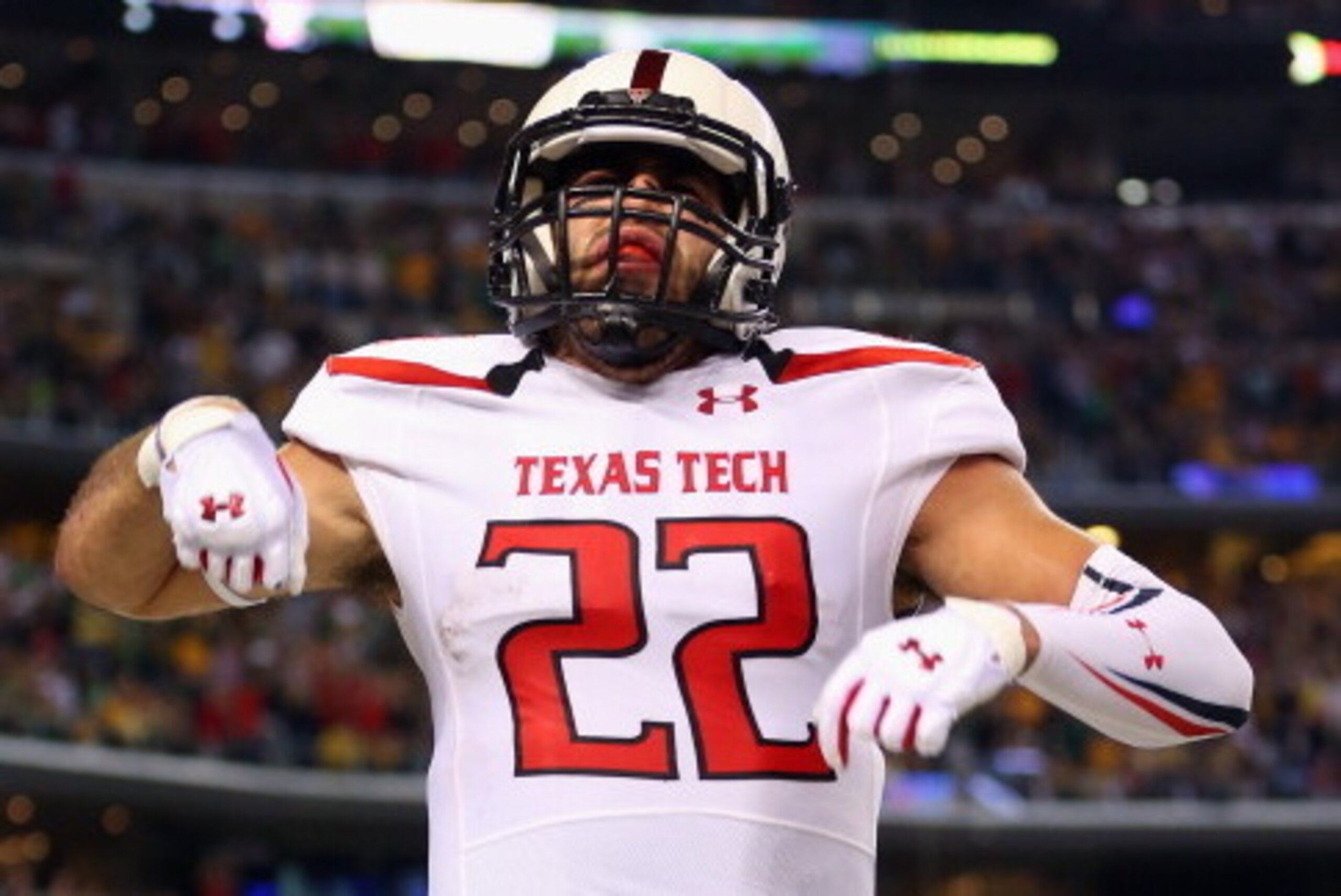 ARLINGTON, TX - NOVEMBER 16:  Jace Amaro #22 of the Texas Tech Red Raiders celebrates a touchdown against the Baylor Bears at AT&T Stadium on November 16, 2013 in Arlington, Texas.  (Photo by Ronald Martinez/Getty Images)