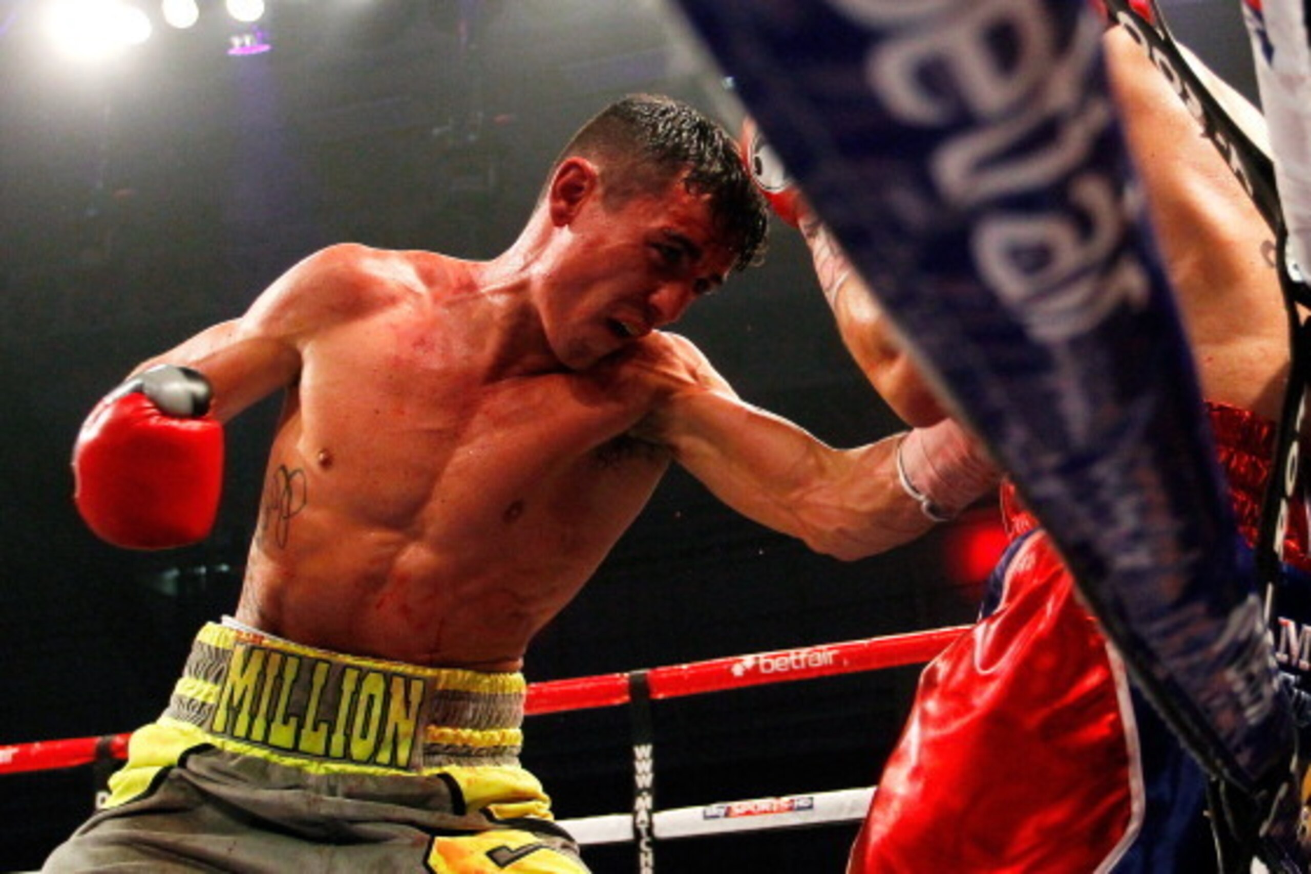 BOLTON, ENGLAND - JUNE 29:  Anthony Crolla (L) in action with Gavin Rees during the WBO Inter-Continental Lightweight championship fight at Bolton Arena on June 29, 2013 in Bolton, England (Photo by Paul Thomas/Getty Images)