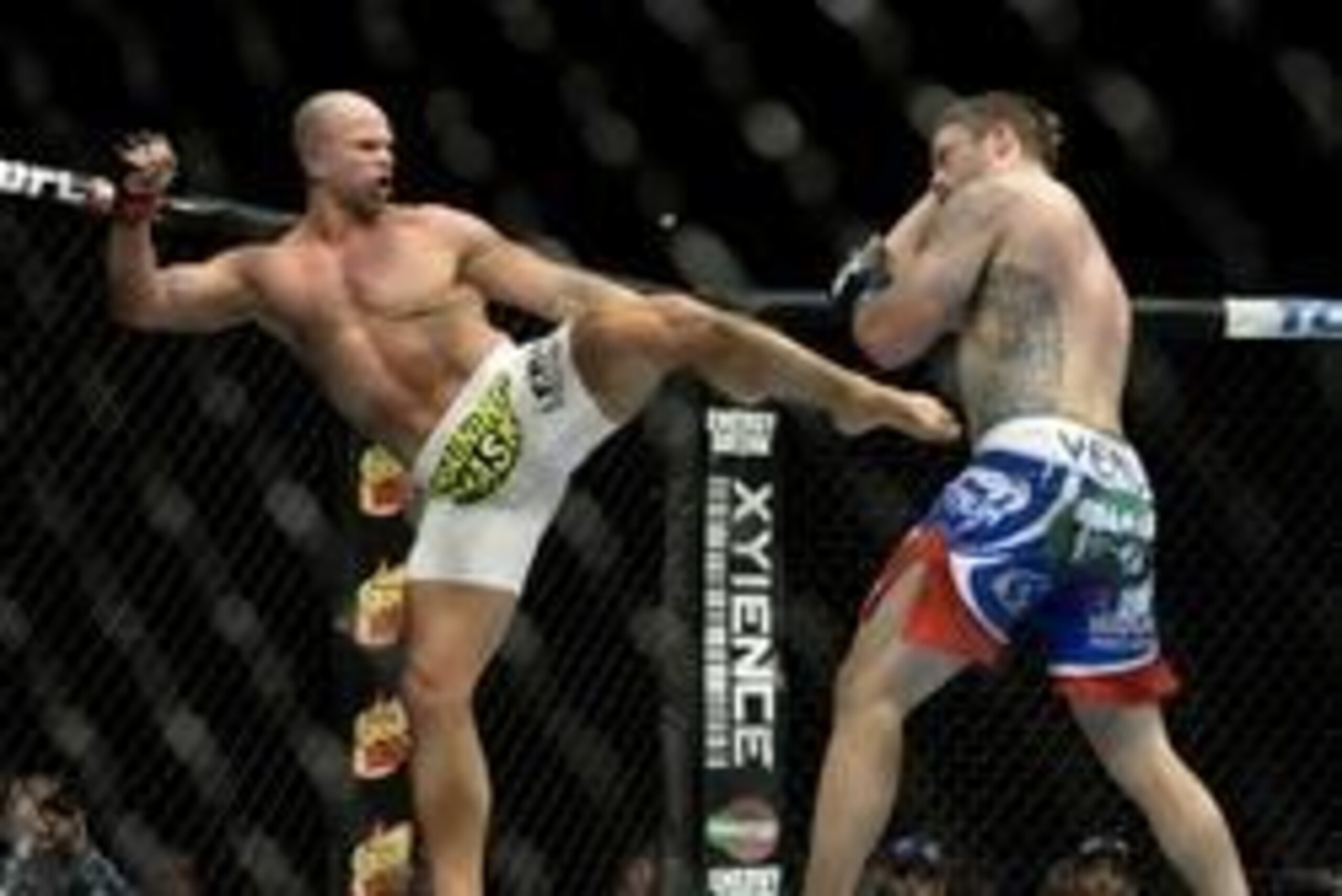 Apr 16, 2014; Quebec City, Quebec, Canada; Ryan Jimmo (red  gloves), Edmonton, Alberta, Canada  won by KO/TKO against  Sean O'Connell ( blue gloves)  Salt Lake City, Utah during their light heavyweight bout at Colisee Pepsi. Mandatory Credit: Eric Bolte-U