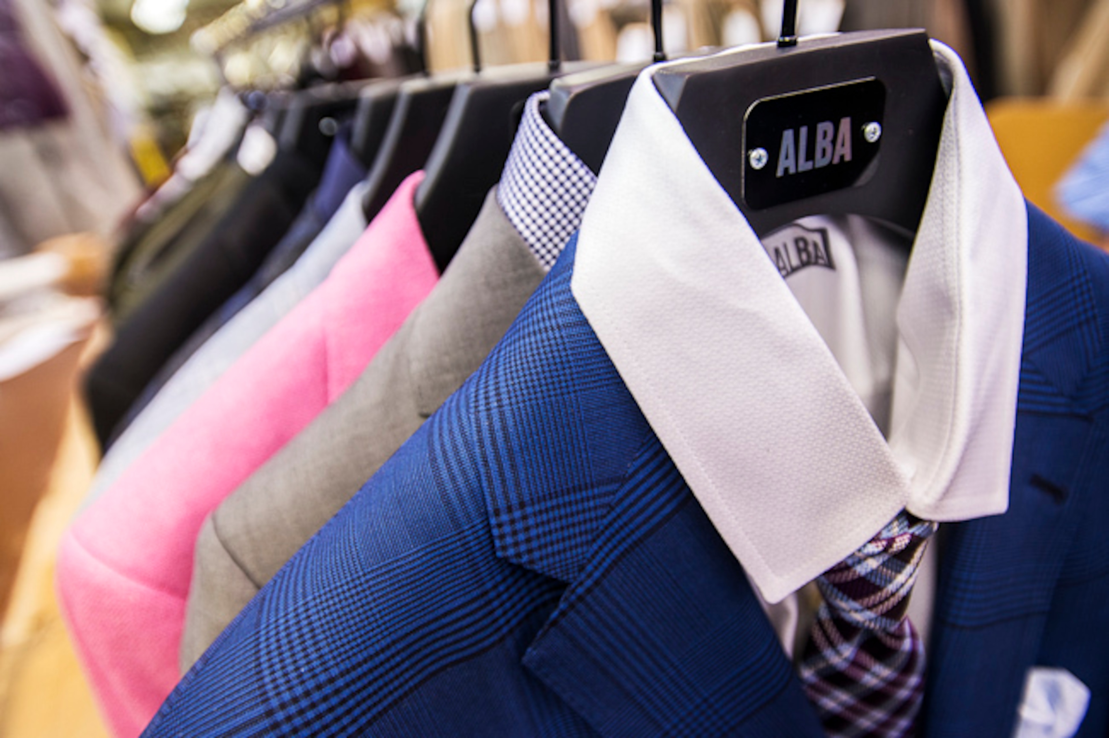 Suits designed by Alba on display in her L.A. manufacturing headquarters. Suits designed by Alba on display in her L.A. manufacturing headquarters.
