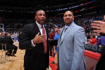 LOS ANGELES, CA - MARCH 12: Head coach Doc Rivers of the Los Angeles Clippers and Mark Jackson of the Golden State Warriors greet each other at Staples Center on March 12, 2014 in Los Angeles, California. NOTE TO USER: User expressly acknowledges and agre