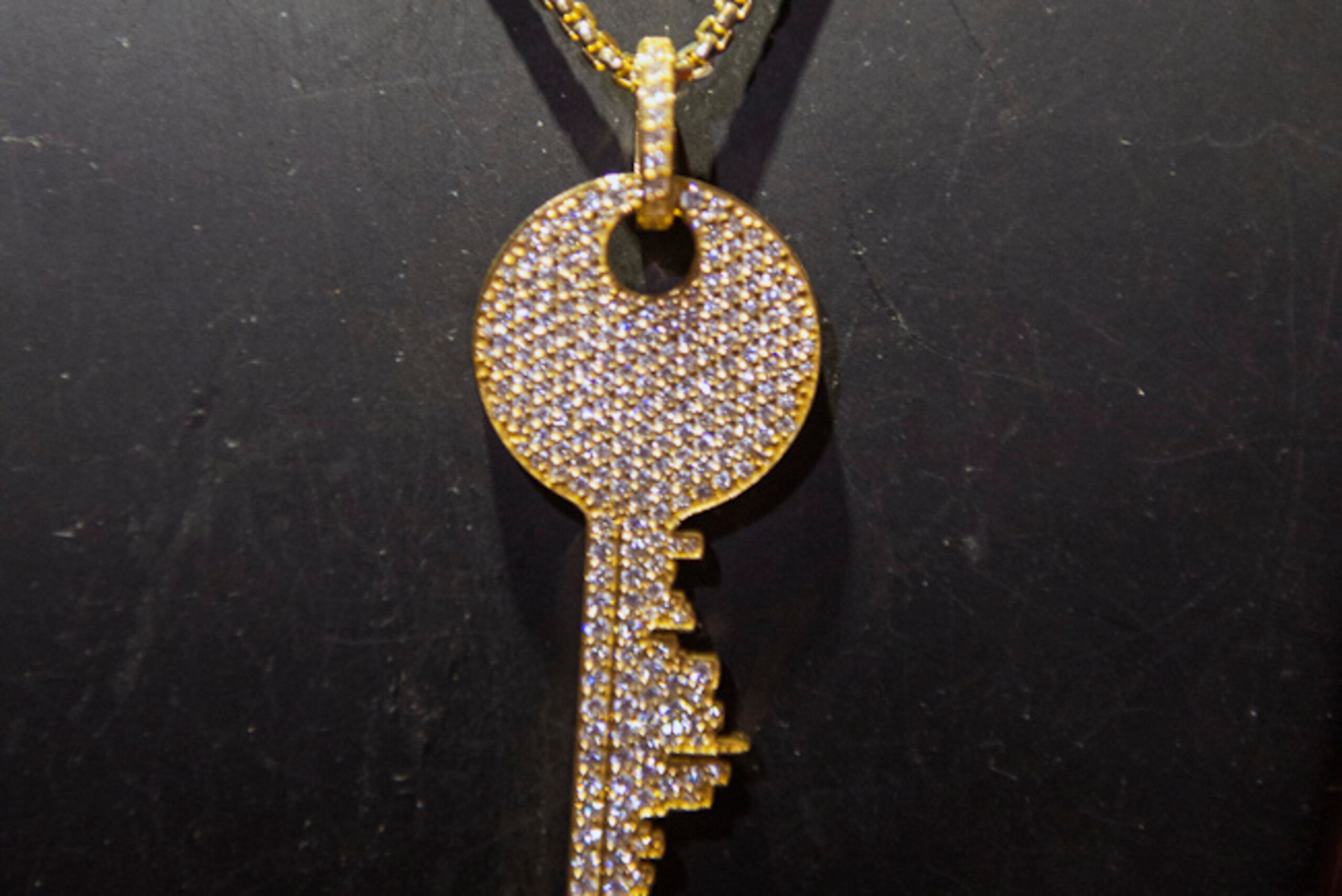 A diamond key with the skyline of Los Angeles designed and produced by Arasheben.