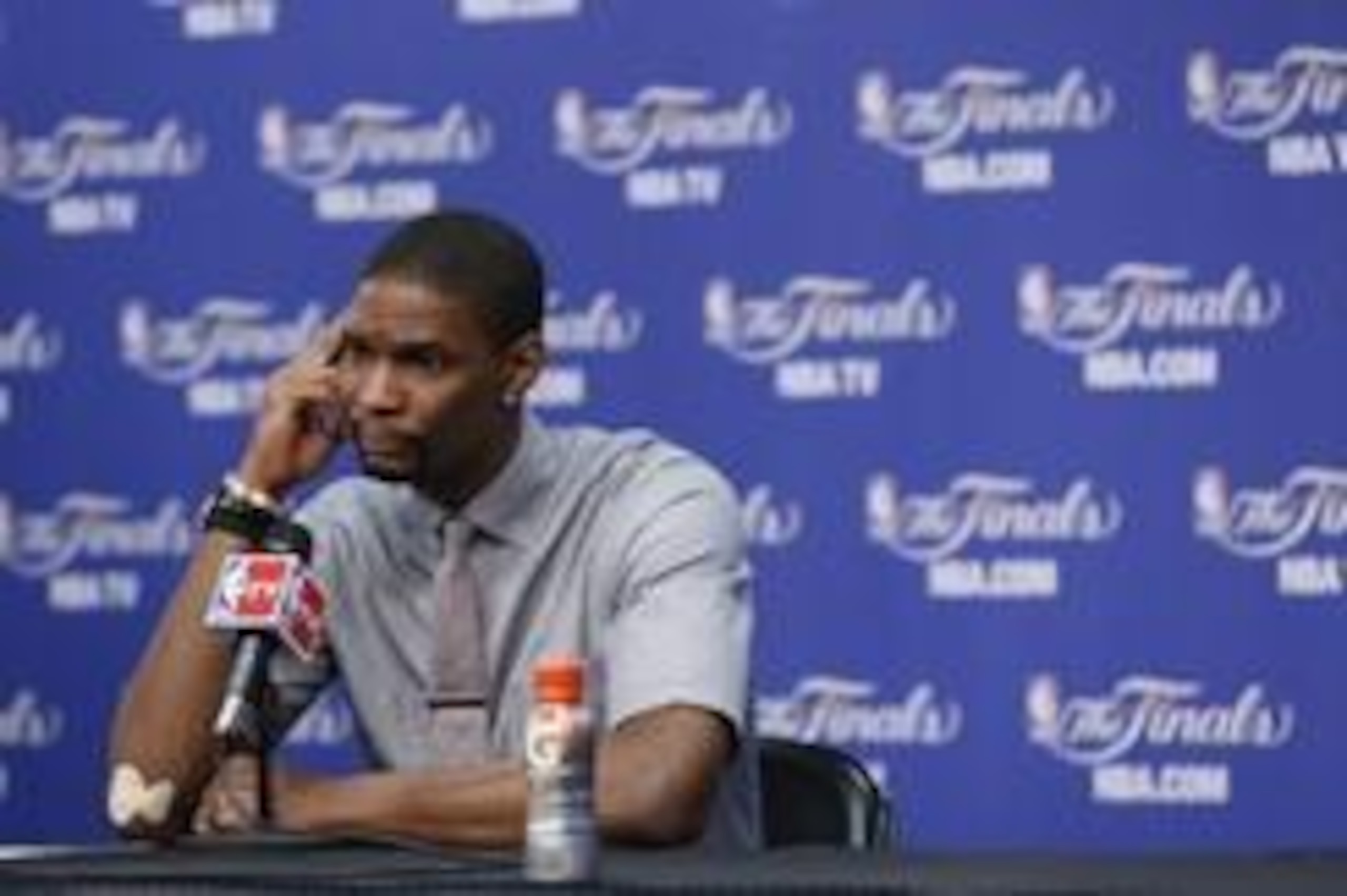 Jun 13, 2013; San Antonio, TX, USA; Miami Heat center Chris Bosh speaks at a postgame press conference following game four against the San Antonio Spurs in the 2013 NBA Finals at the AT&T Center. The Heat defeated the Spurs 109-93. Mandatory Credit: Soobu