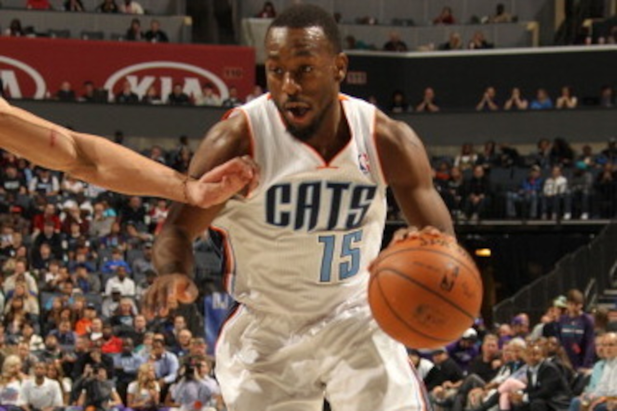 CHARLOTTE, NC - APRIL 16:  Kemba Walker #15 of the Charlotte Bobcats drives to the basket against the Chicago Bulls during the game at the Time Warner Cable Arena on April 16, 2014 in Charlotte, North Carolina. NOTE TO USER: User expressly acknowledges an