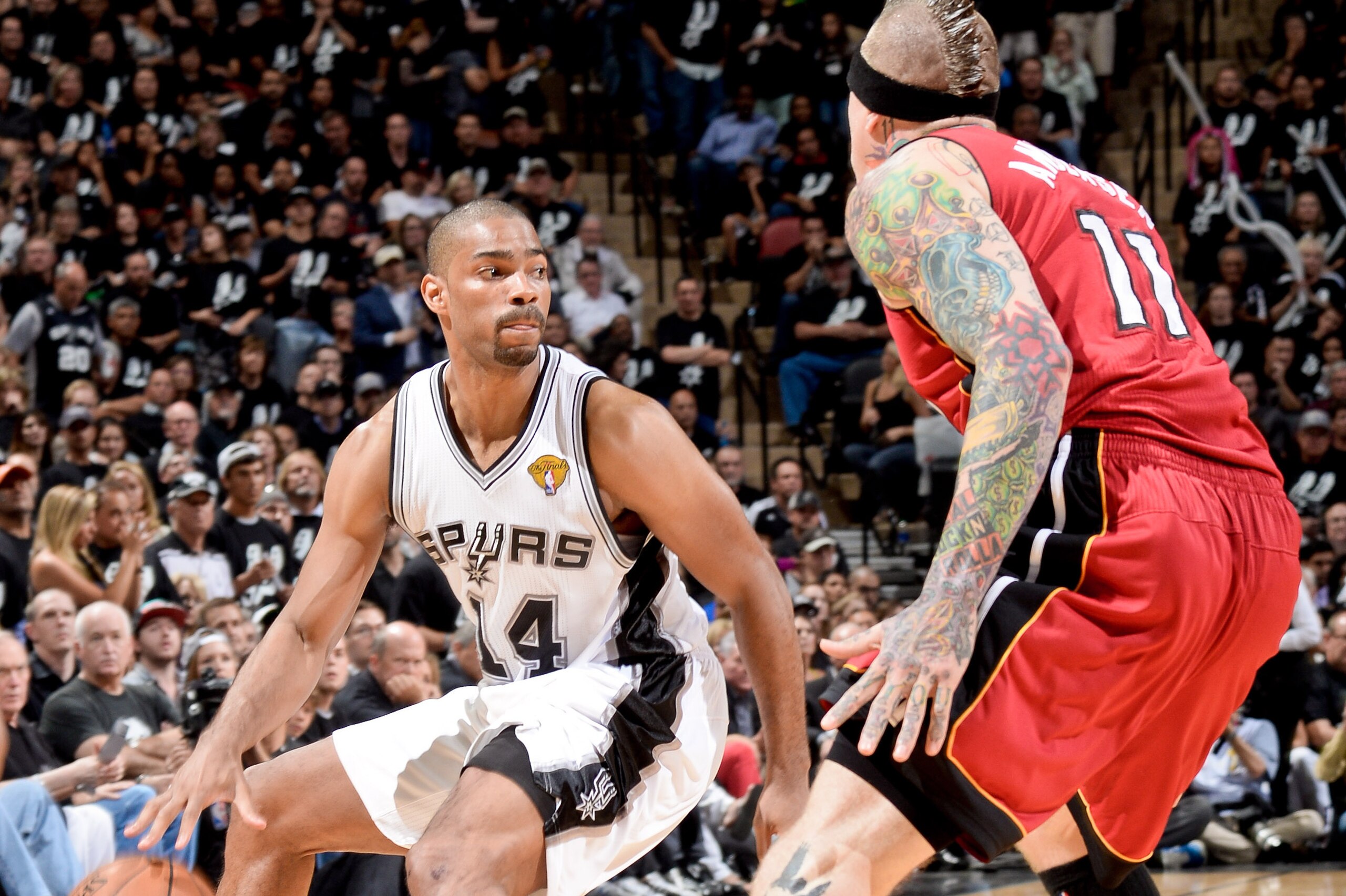 SAN ANTONIO, TX - JUNE 11: Gary Neal #14 of the San Antonio Spurs controls the ball against Chris Andersen #11 of the Miami Heat during Game Three of the 2013 NBA Finals on June 11, 2013 at AT&T Center in San Antonio, Texas. NOTE TO USER: User expressly a