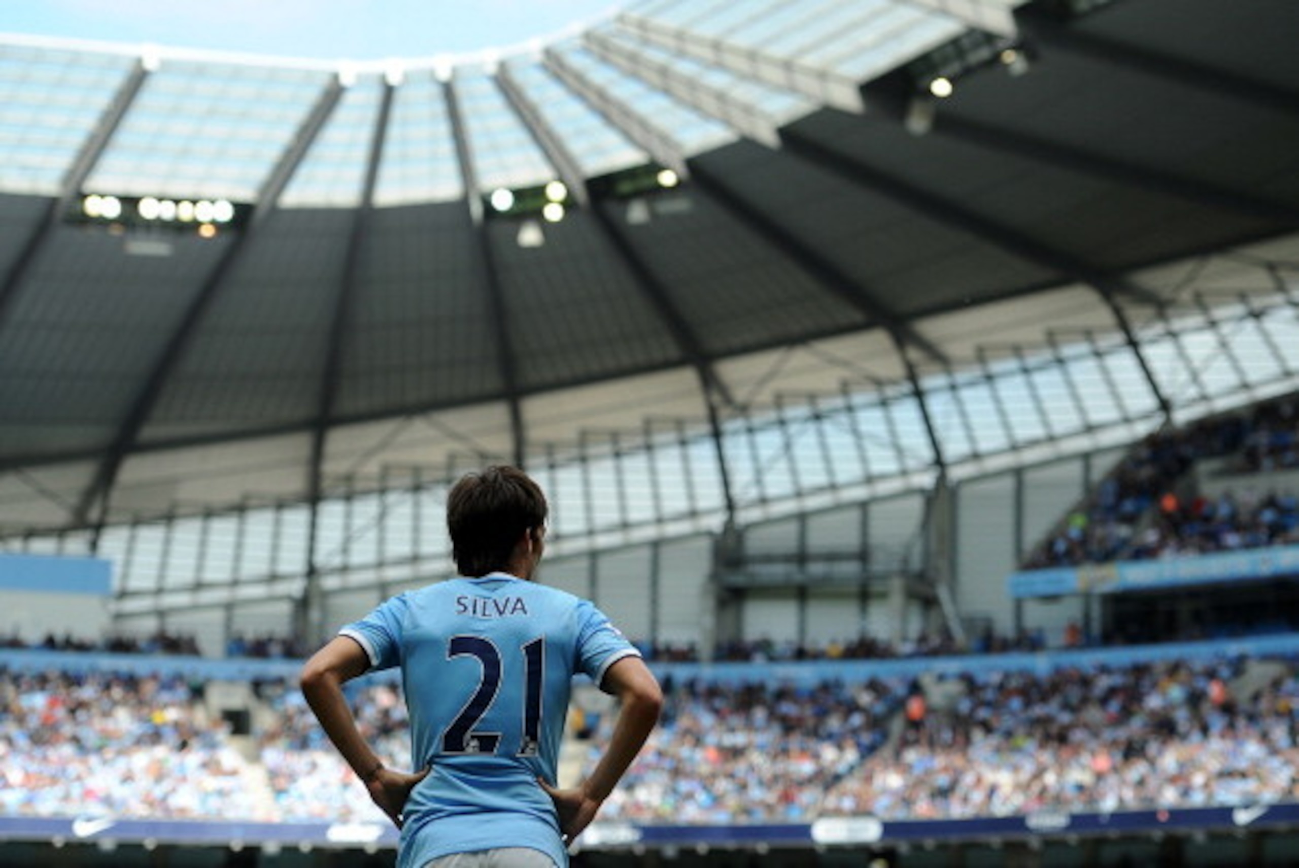 MANCHESTER, ENGLAND - AUGUST 31: David Silva of Manchester City looks on during the Barclays Premier League match between Manchester City and Hull City at the Etihad Stadium on August 31, 2013 in Manchester, England. (Photo by Chris Brunskill/Getty Images