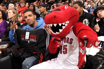 TORONTO, ON - DECEMBER 01:  The Toronto Raptor welcomes rapper Drake courtside as the Toronto Raptors host the Washington Wizards on December 1, 2010 at the Air Canada Centre in Toronto, Ontario, Canada.  NOTE TO USER: User expressly acknowledges and agre