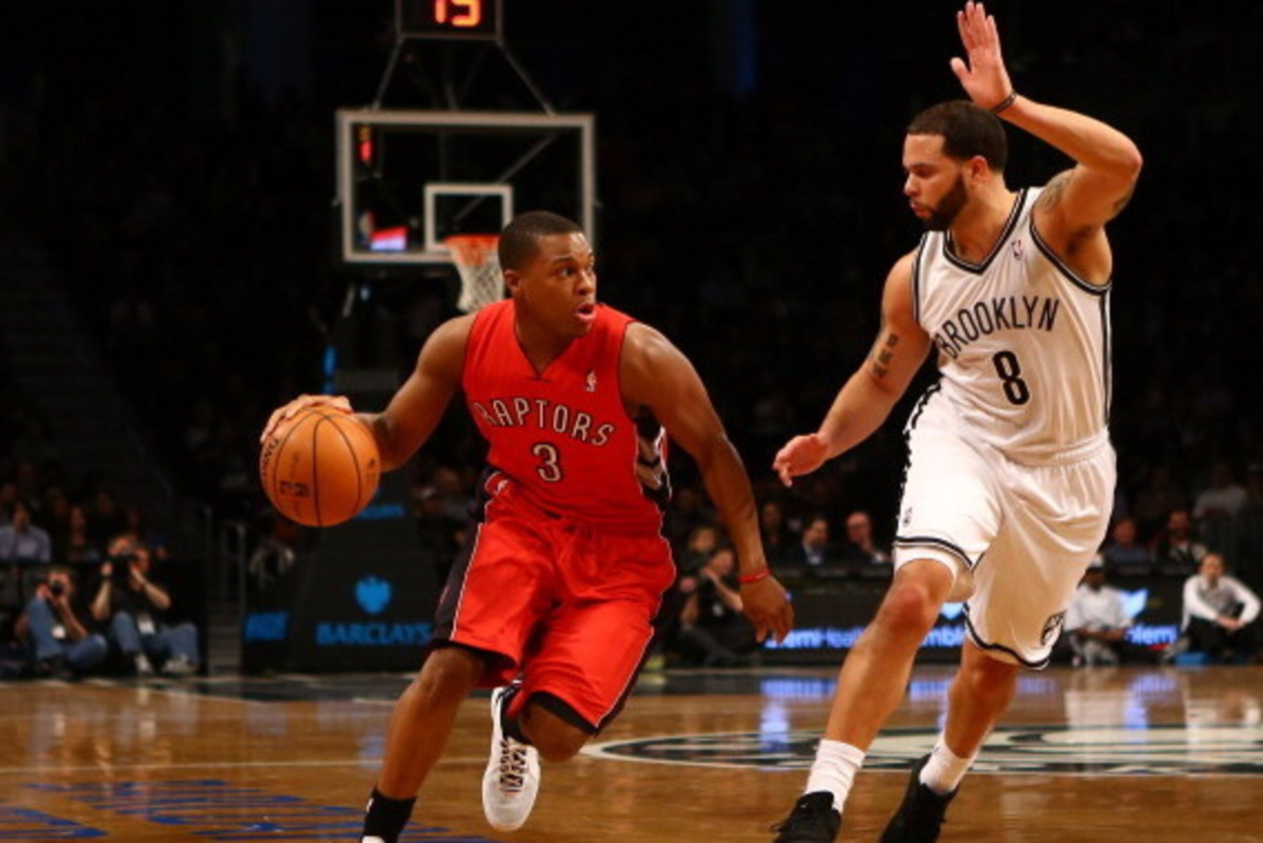 NEW YORK, NY - JANUARY 15: Toronto Raptors point guard Kyle Lowry #3 in action against Brooklyn Nets point guard Deron Williams #8 during their game at the Barclays Center on January15, 2013 in the Brooklyn borough of New York City. NOTE TO USER: User ex NEW YORK, NY - JANUARY 15: Toronto Raptors point guard Kyle Lowry #3 in action against Brooklyn Nets point guard Deron Williams #8 during their game at the Barclays Center on January15, 2013 in the Brooklyn borough of New York City. NOTE TO USER: User ex