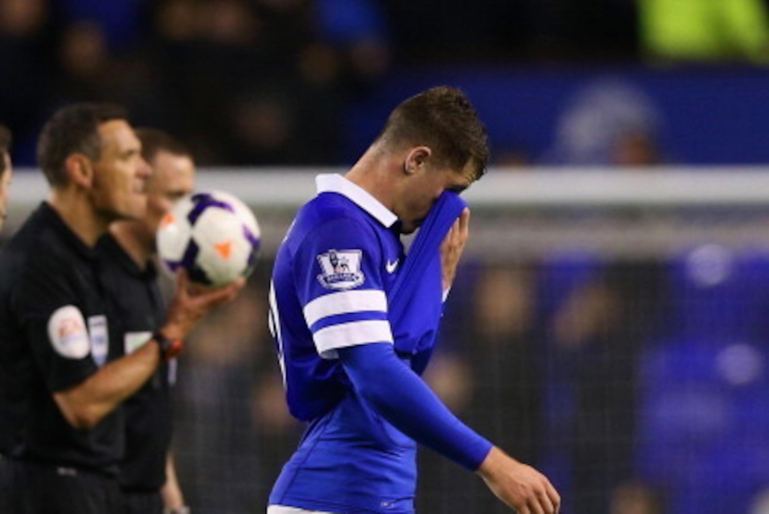 LIVERPOOL, ENGLAND - APRIL 16:  A dejected Ross Barkley of Everton leaves the field after defeat during the Barclays Premier League match between Everton and Crystal Palace at Goodison Park on April 16, 2014 in Liverpool, England.  (Photo by Clive Brunski
