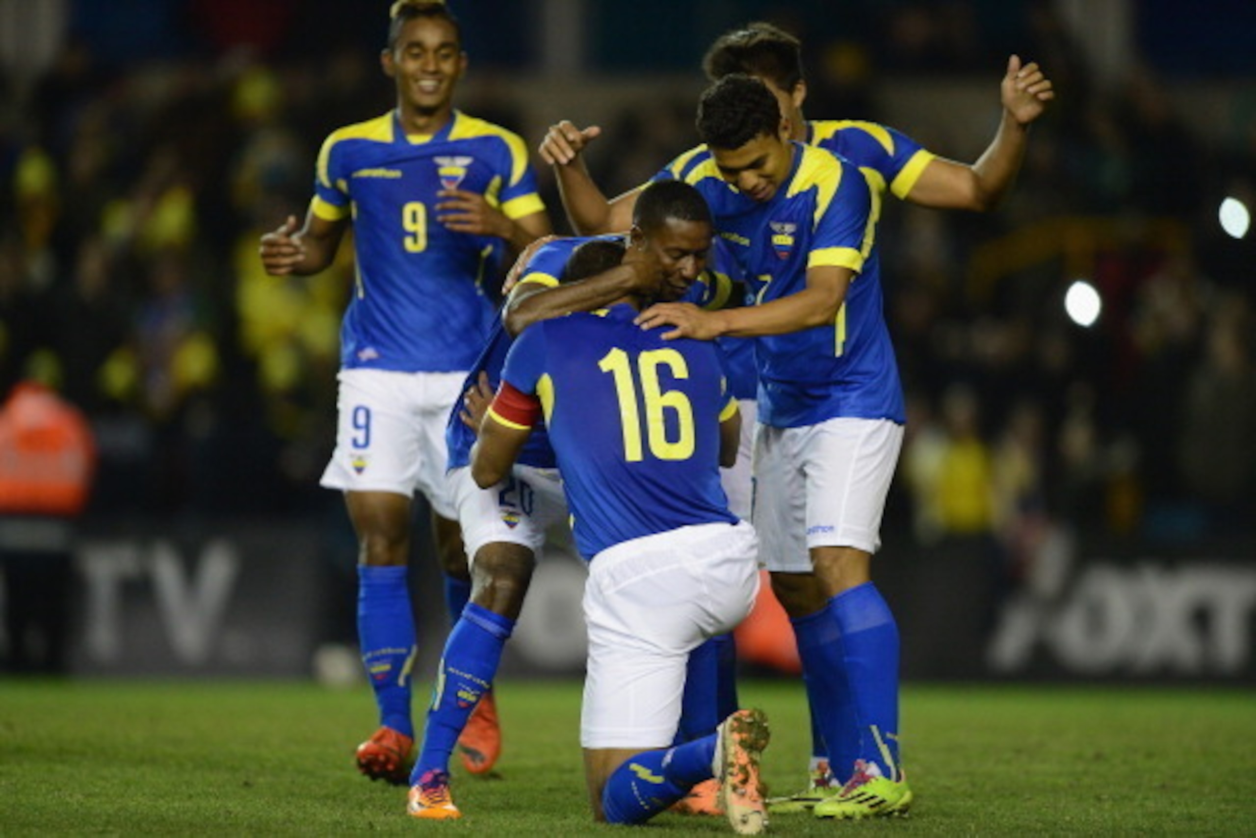 LONDON, ENGLAND - MARCH 05:  Edison Mendez of Ecuador celebrates his winning goal with team mates during the International Friendly match between Australia and Ecuador at The Den on March 5, 2014 in London, England.  (Photo by Jamie McDonald/Getty Images)