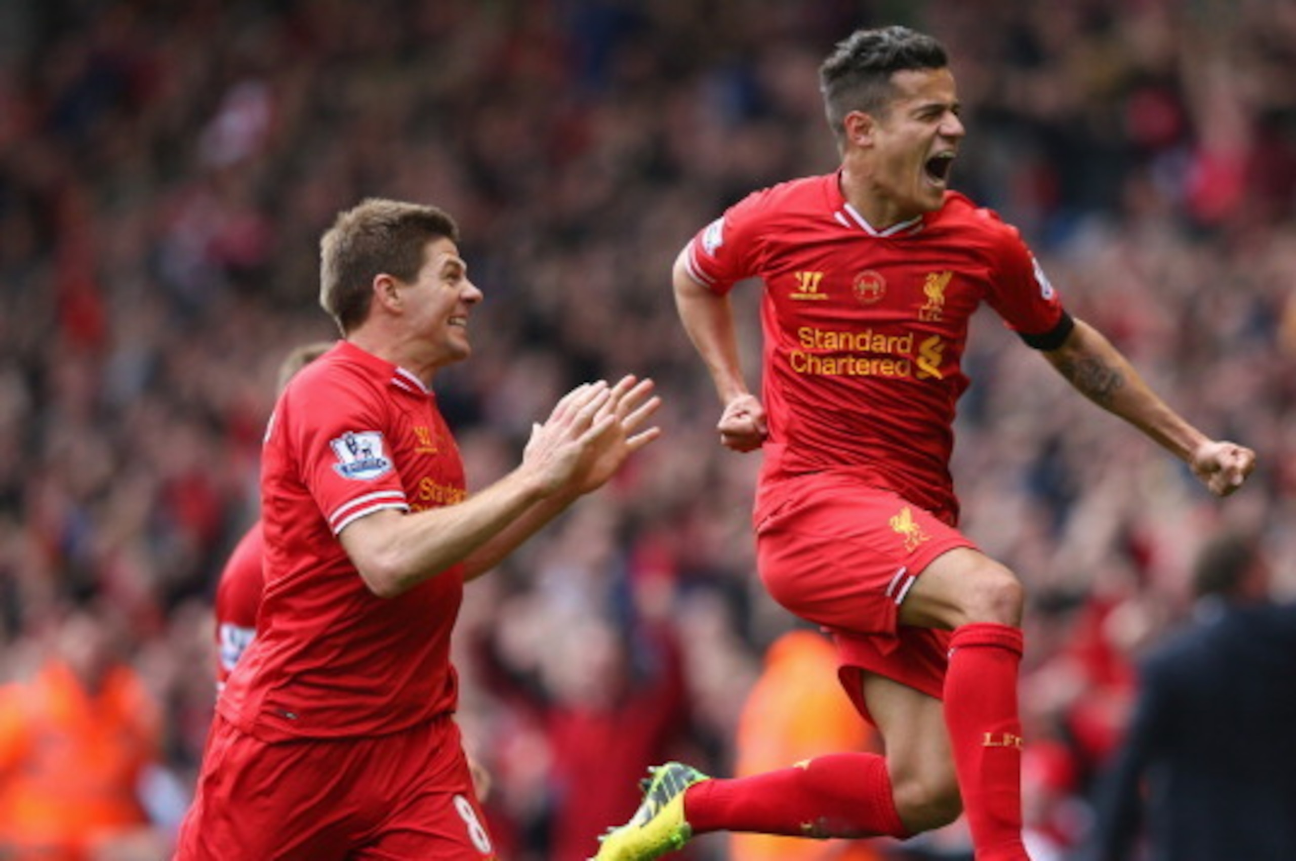 LIVERPOOL, ENGLAND - APRIL 13:  Philippe Coutinho of Liverpool celebrates scoring his team's third goal during the Barclays Premier League match between Liverpool and Manchester City at Anfield on April 13, 2014 in Liverpool, England.  (Photo by Alex Live