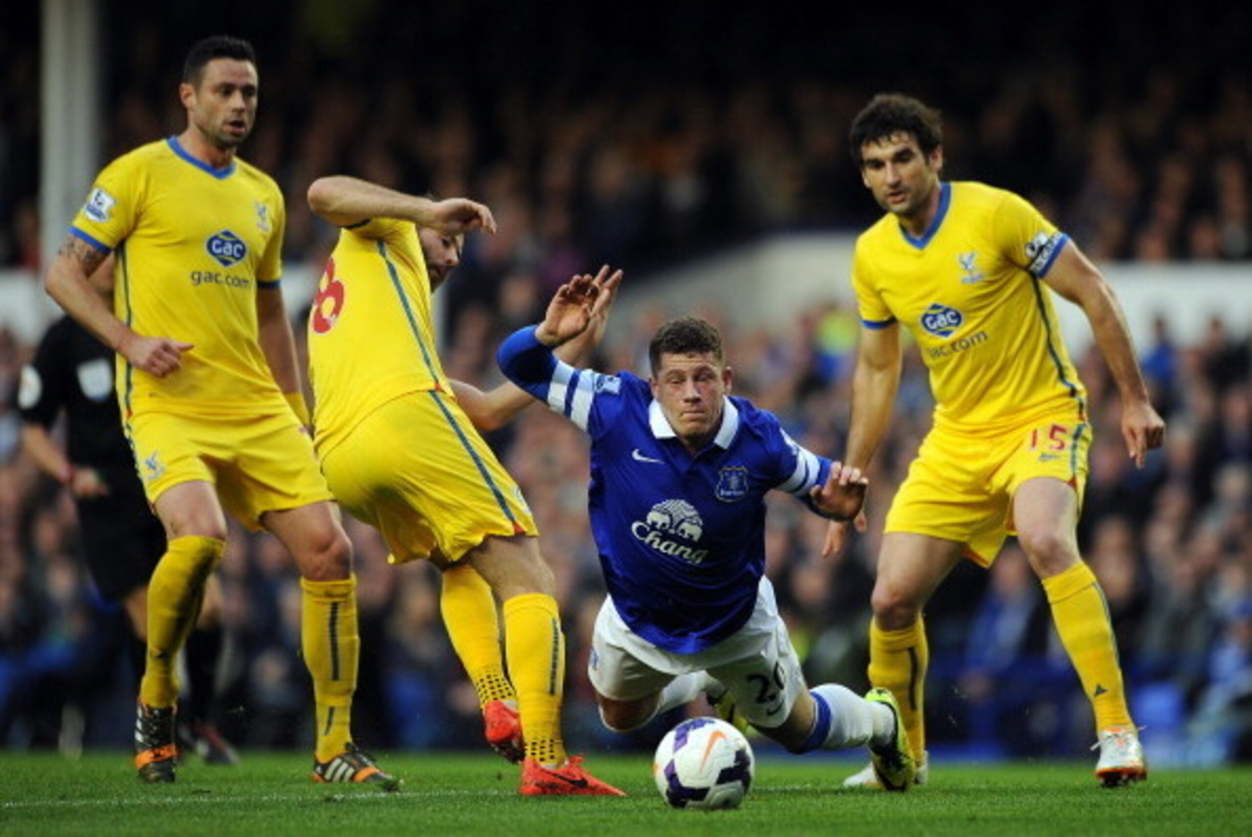 LIVERPOOL, ENGLAND - APRIL 16: Ross Barkley of Everton in action with Joe Ledley of Crystal Palace during the Barclays Premier League match between Everton and Crystal Palace at Goodison Park on April 16, 2014 in Liverpool, England. (Photo by Chris Brunsk