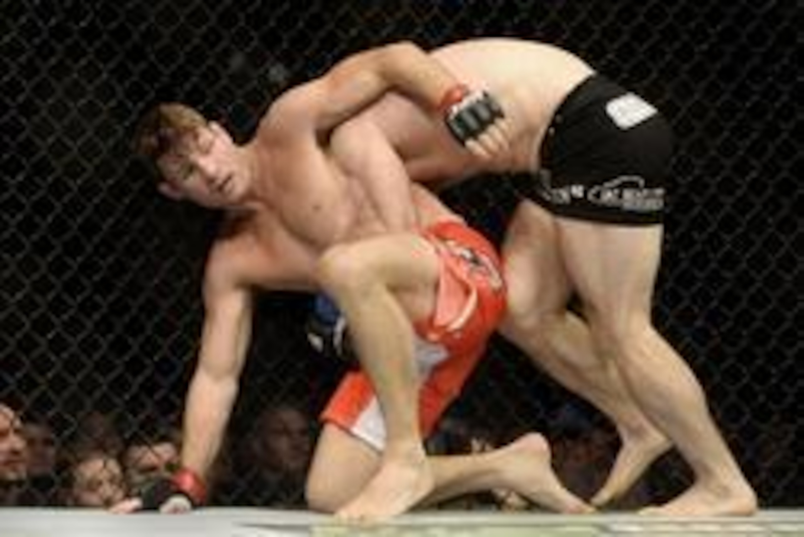 Apr 16, 2014; Quebec City, Quebec, Canada; Michael Bisping (red gloves) fights against Tim Kennedy (blue gloves) during their middleweight bout at Colisee Pepsi. Mandatory Credit: Eric Bolte-USA TODAY Sports