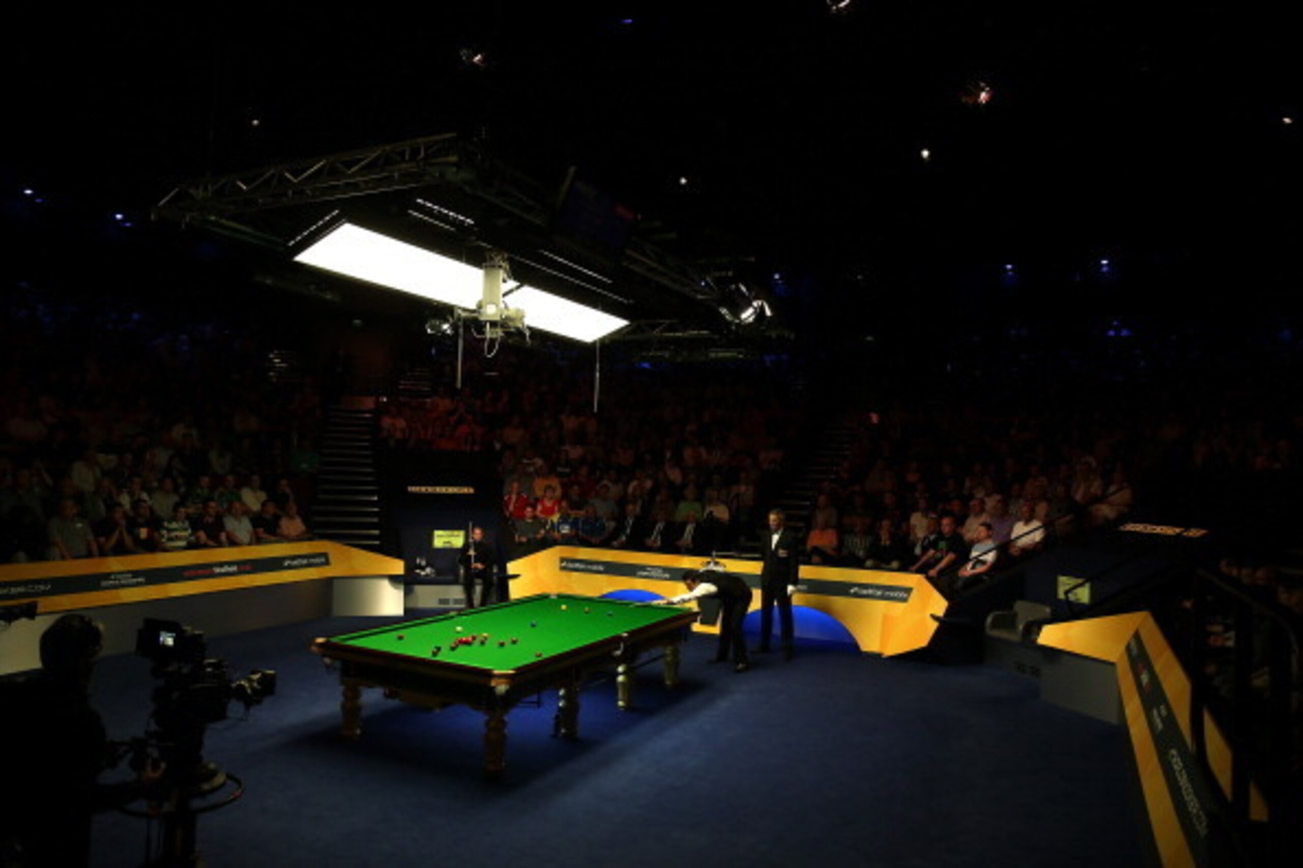 SHEFFIELD, ENGLAND - MAY 06:  Ronnie O'Sullivan of England in action against Barry Hawkins of England during the final of the Betfair World Snooker Championship at the Crucible Theatre on May 6, 2013 in Sheffield, England.  (Photo by Warren Little/Getty I
