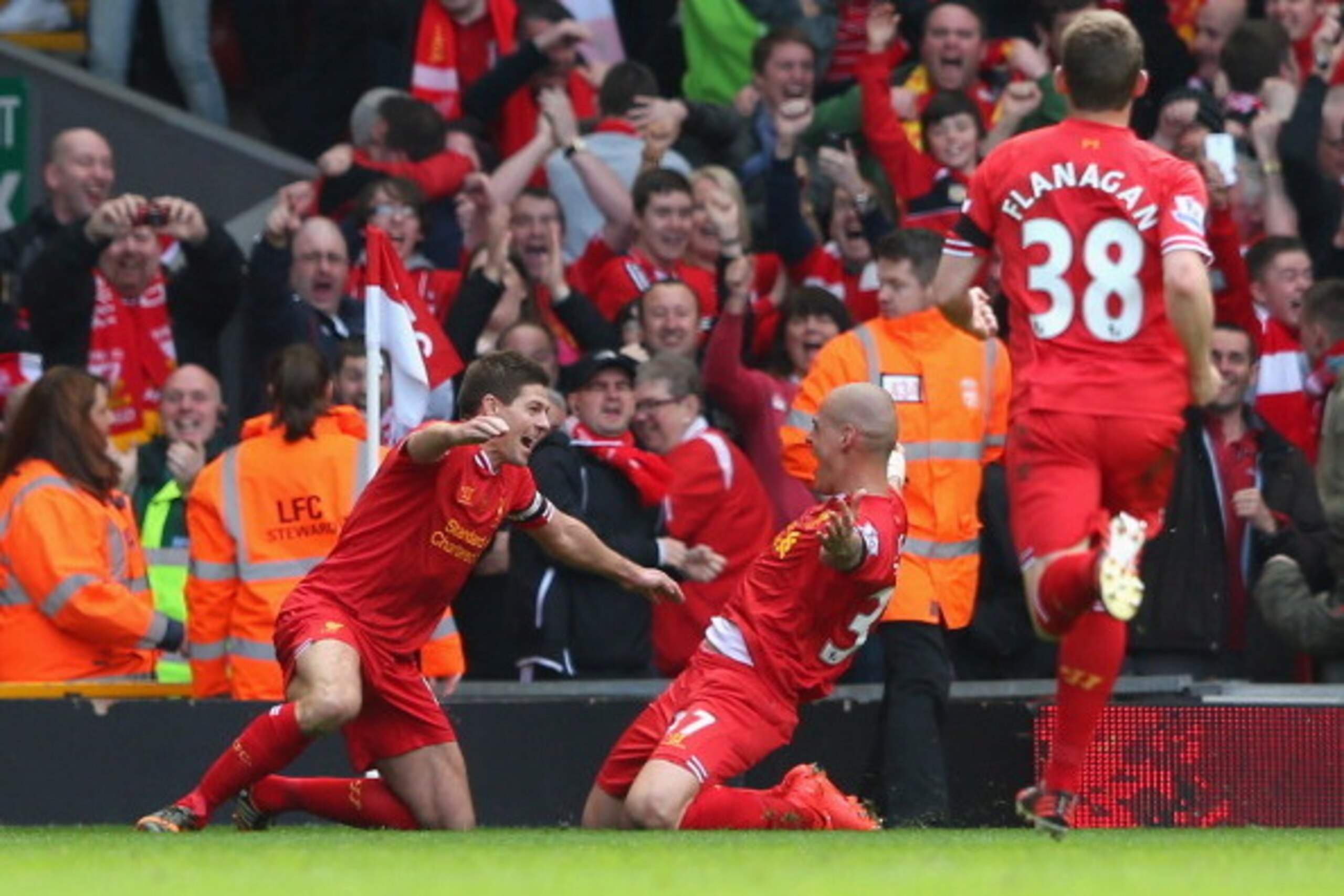 LIVERPOOL, ENGLAND - APRIL 13:  Martin Skrtel of Liverpool celebrates scoring the second goal with team-mate Steven Gerrard (L) during the Barclays Premier League match between Liverpool and Manchester City at Anfield on April 13, 2014 in Liverpool, Engla
