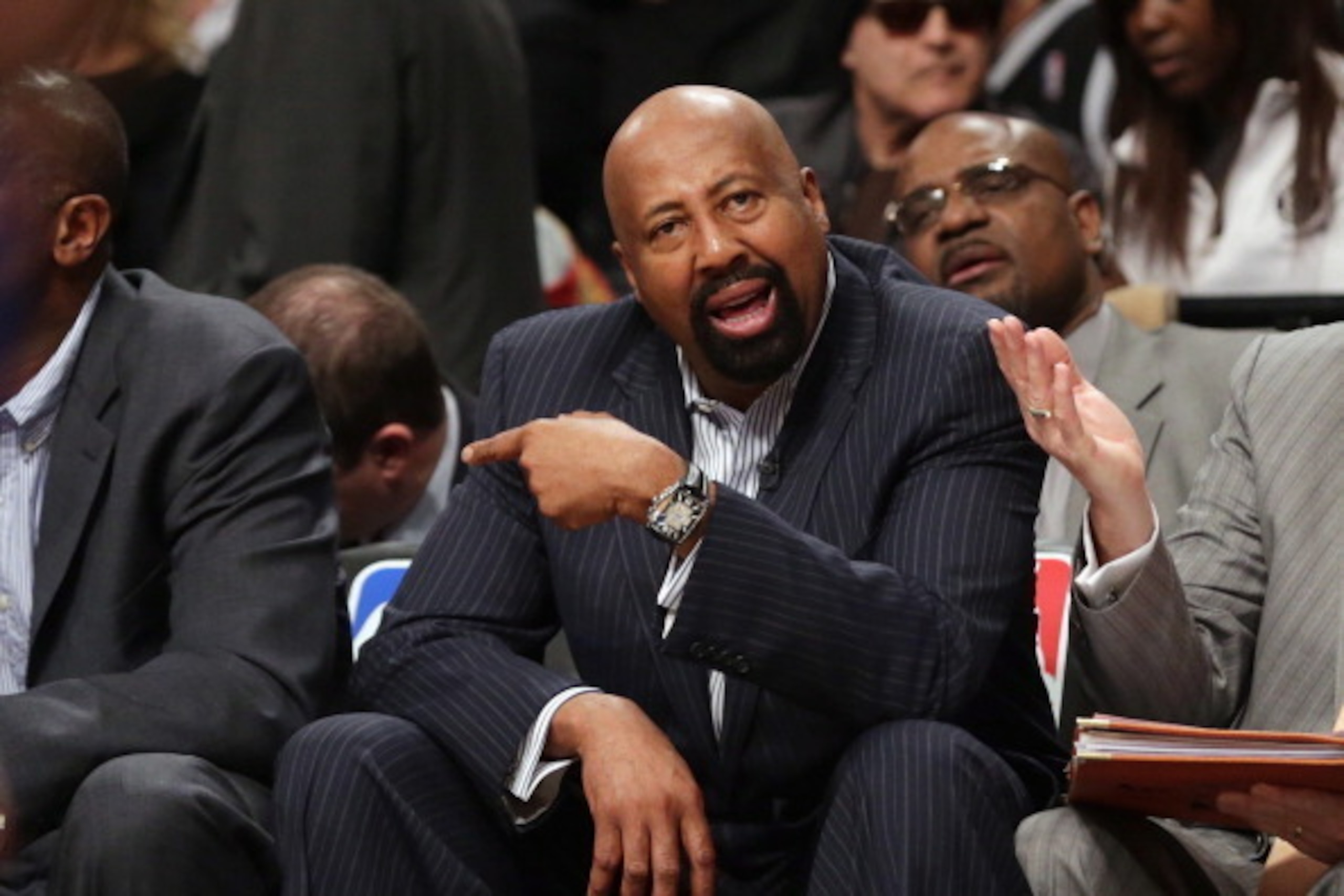 NEW YORK, NY - APRIL 15:  Mike Woodson of the New York Knicks handles bench duties during the game against the Brooklyn Nets at the Barclays Center on April 15, 2014 in the Brooklyn borough of New York City. NOTE TO USER: User expressly acknowledges and a