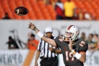 Apr 12, 2014; Miami, FL, USA; Miami Hurricanes quarterback Kevin Olsen (19) throws a pass during a spring game at Sun Life Stadium. Mandatory Credit: Steve Mitchell-USA TODAY Sports Apr 12, 2014; Miami, FL, USA; Miami Hurricanes quarterback Kevin Olsen (19) throws a pass during a spring game at Sun Life Stadium. Mandatory Credit: Steve Mitchell-USA TODAY Sports