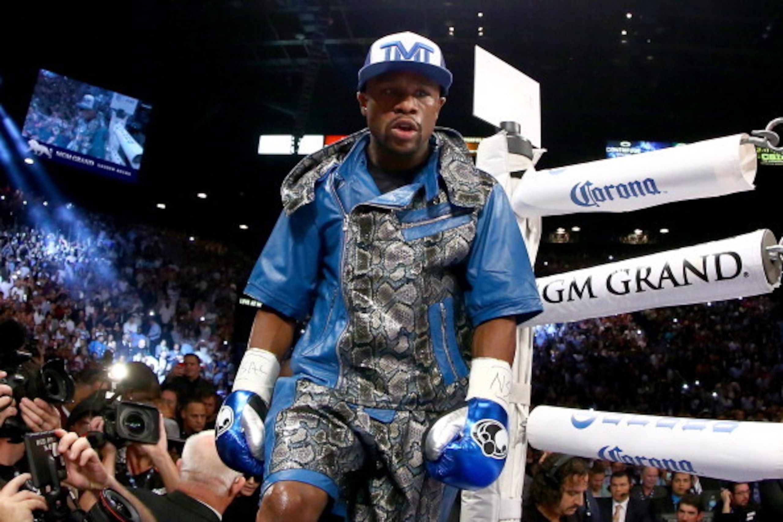 LAS VEGAS, NV - SEPTEMBER 14: Floyd Mayweather Jr. enters the ring to take on Canelo Alvarez in their WBC/WBA 154-pound title fight at the MGM Grand Garden Arena on September 14, 2013 in Las Vegas, Nevada. (Photo by Al Bello/Getty Images) LAS VEGAS, NV - SEPTEMBER 14: Floyd Mayweather Jr. enters the ring to take on Canelo Alvarez in their WBC/WBA 154-pound title fight at the MGM Grand Garden Arena on September 14, 2013 in Las Vegas, Nevada. (Photo by Al Bello/Getty Images)