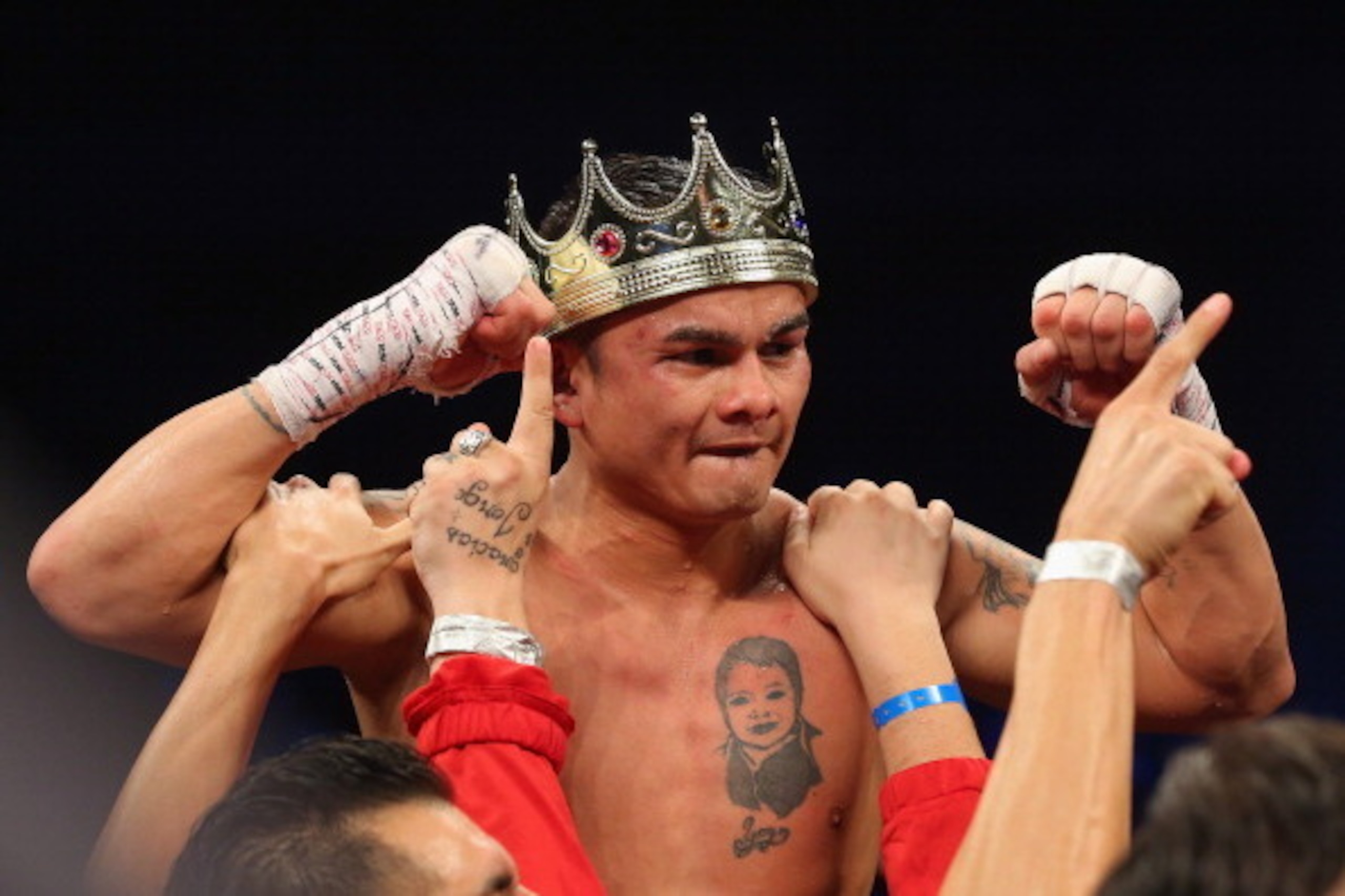 SAN ANTONIO, TX - DECEMBER 14: Marcos Maidana celebrates his unanimous decision against Adrien Broner becoming the new WBA Welterweight Title champion at Alamodome on December14, 2013 in San Antonio, Texas.during their bout at Alamodome on December 14, 2 SAN ANTONIO, TX - DECEMBER 14: Marcos Maidana celebrates his unanimous decision against Adrien Broner becoming the new WBA Welterweight Title champion at Alamodome on December14, 2013 in San Antonio, Texas.during their bout at Alamodome on December 14, 2