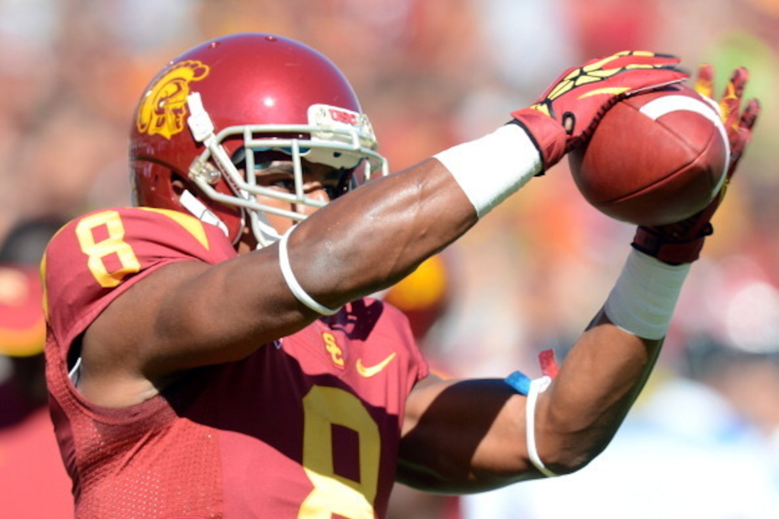 LOS ANGELES, CA - SEPTEMBER 01:  George Farmer #8 of the USC Trojans warms up before the game against the Hawaii Warriors at Los Angeles Coliseum on September 1, 2012 in Los Angeles, California.  (Photo by Harry How/Getty Images)
