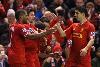 LIVERPOOL, ENGLAND - MARCH 26: Steven Gerrard of Liverpool celebrates scoring the first goal with team-mate Luis Suarez (R) during the Barclays Premier League match between Liverpool and Sunderland at Anfield on March 26, 2014 in Liverpool, England. (Ph LIVERPOOL, ENGLAND - MARCH 26: Steven Gerrard of Liverpool celebrates scoring the first goal with team-mate Luis Suarez (R) during the Barclays Premier League match between Liverpool and Sunderland at Anfield on March 26, 2014 in Liverpool, England. (Ph