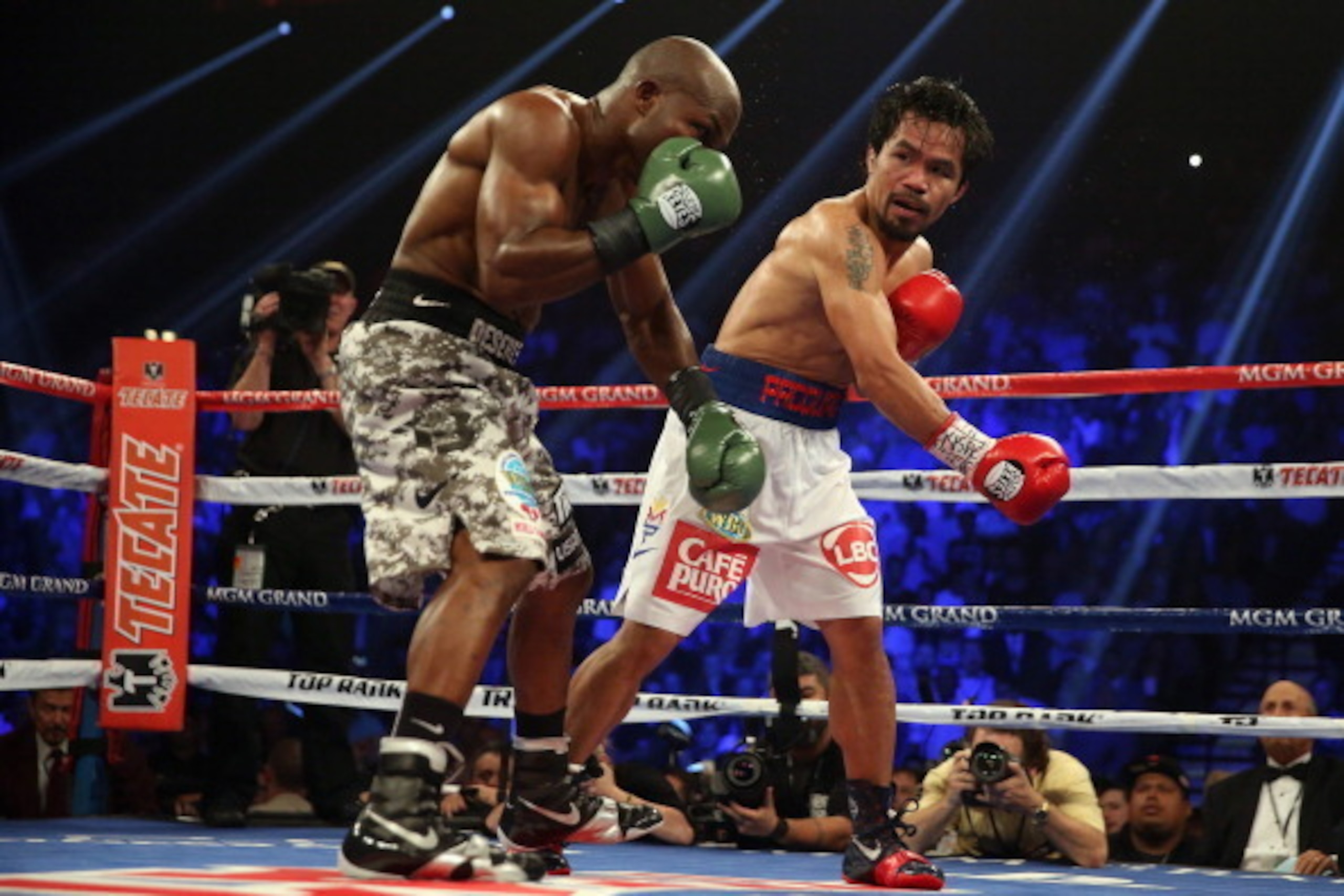 LAS VEGAS, NV - APRIL 12: Manny Pacquiao follows through on a right hand to Timothy Bradley at the MGM Grand Garden Arena on April 12, 2014 in Las Vegas, Nevada. (Photo by Jeff Gross/Getty Images) LAS VEGAS, NV - APRIL 12: Manny Pacquiao follows through on a right hand to Timothy Bradley at the MGM Grand Garden Arena on April 12, 2014 in Las Vegas, Nevada. (Photo by Jeff Gross/Getty Images)
