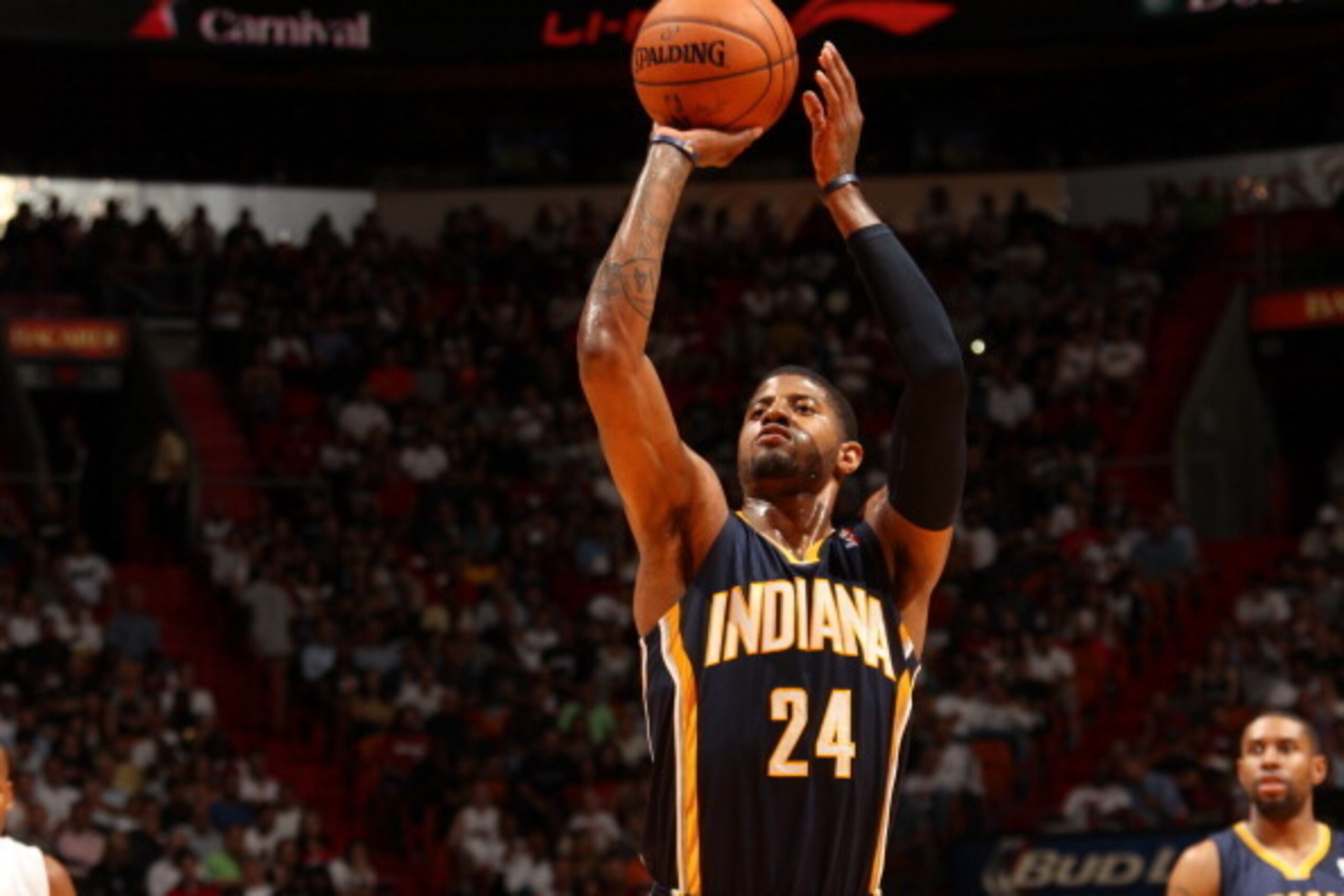 MIAMI, FL - April 11: Paul George #24 of the Indiana Pacers takes a free throw against the Miami Heat at the American Airlines Arena in Miami, Florida on April 11, 2014. NOTE TO USER: User expressly acknowledges and agrees that, by downloading and/or usin