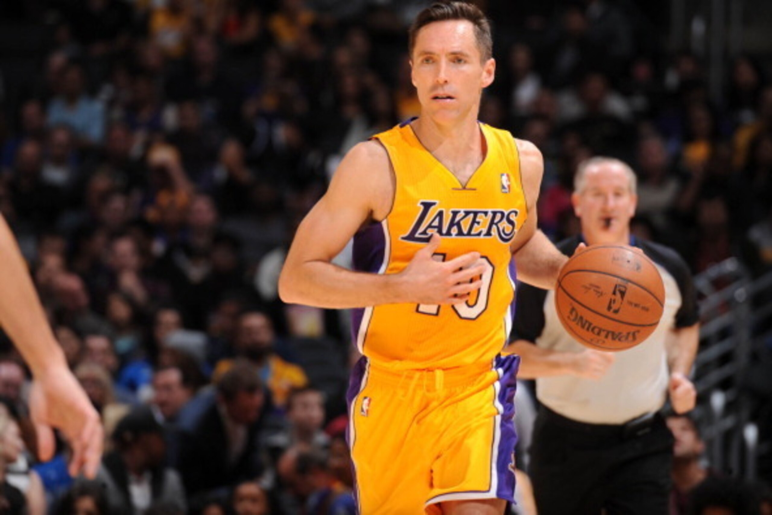 LOS ANGELES, CA - APRIL 4: Steve Nash #10 of the Los Angeles Lakers handles the ball against the Dallas Mavericks at Staples Center on April 4, 2014 in Los Angeles, California. NOTE TO USER: User expressly acknowledges and agrees that, by downloading and/