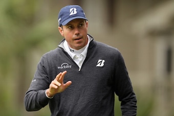 HILTON HEAD ISLAND, SC - APRIL 17:  Matt Kuchar acknowledges the gallery on the 16th green during the first round of the RBC Heritage at Harbour Town Golf Links on April 17, 2014 in Hilton Head Island, South Carolina.  (Photo by Tyler Lecka/Getty Images)