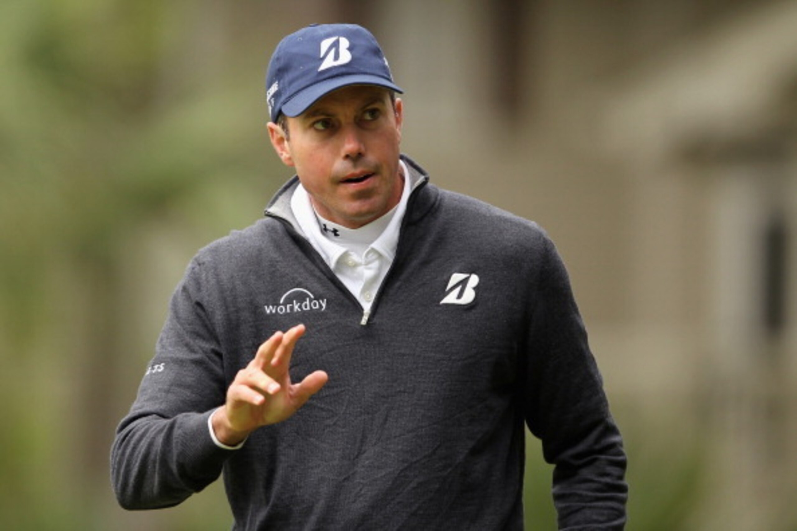 HILTON HEAD ISLAND, SC - APRIL 17:  Matt Kuchar acknowledges the gallery on the 16th green during the first round of the RBC Heritage at Harbour Town Golf Links on April 17, 2014 in Hilton Head Island, South Carolina.  (Photo by Tyler Lecka/Getty Images)