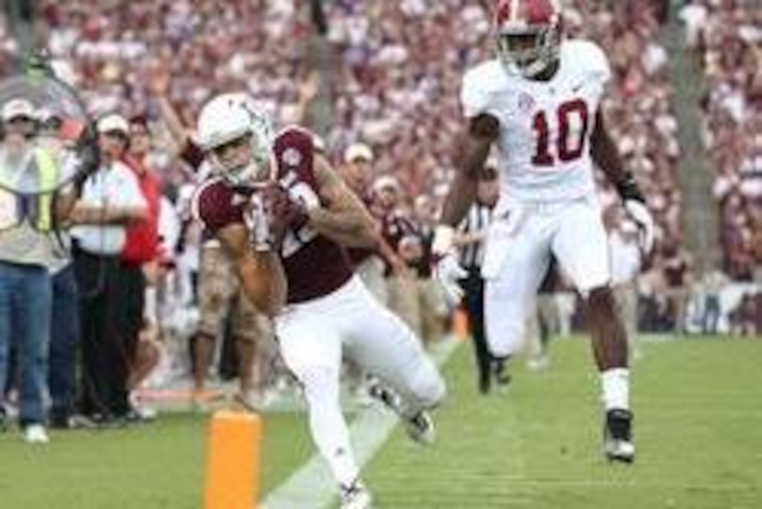Sep 14, 2013; College Station, TX, USA; Texas A&M Aggies receiver Mike Evans (13) makes a catch in the first quarter against Alabama Crimson Tide cornerback John Fulton (10) at Kyle Field. Mandatory Credit: Matthew Emmons-USA TODAY Sports