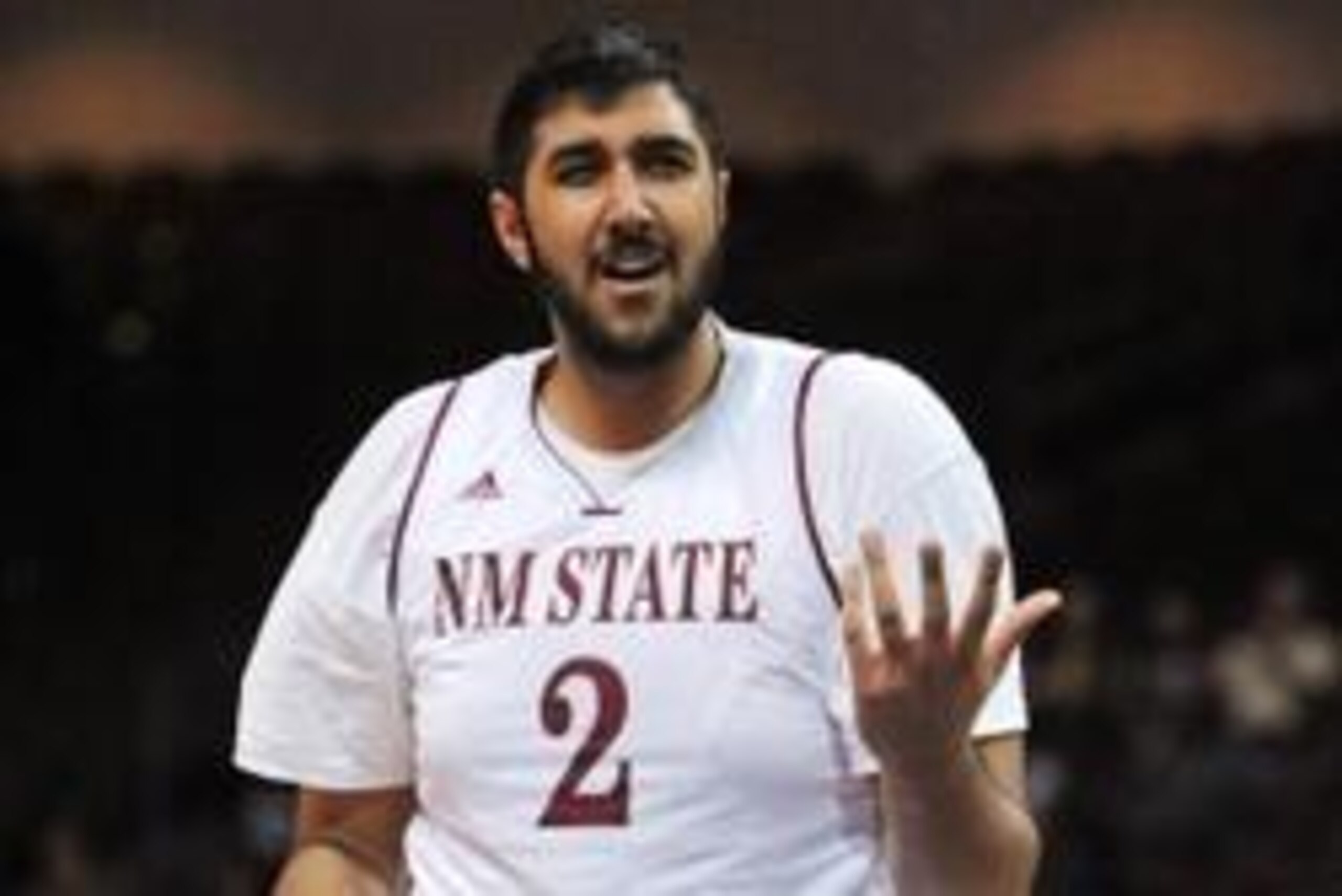 Mar 15, 2014; Las Vegas, NV, USA; New Mexico State Aggies player Sim Bhullar reacts after a foul is called in the championship game for the WAC Conference college basketball tournament against the Idaho Vandals at Orleans Arena. Mandatory Credit: Stephen Mar 15, 2014; Las Vegas, NV, USA; New Mexico State Aggies player Sim Bhullar reacts after a foul is called in the championship game for the WAC Conference college basketball tournament against the Idaho Vandals at Orleans Arena. Mandatory Credit: Stephen