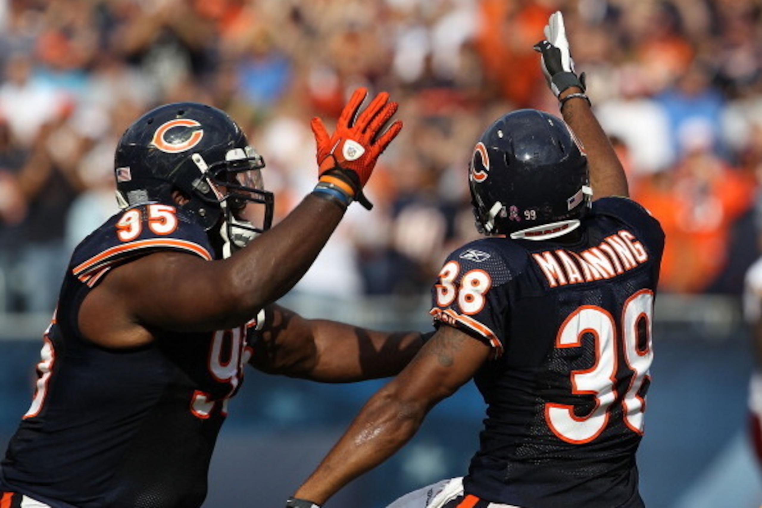 CHICAGO - OCTOBER 24: Danieal Manning #38 and Anthony Adams #95 of the Chicago Bears celebrate Mannings' interception against the Washington Redskins at Soldier Field on October 24, 2010 in Chicago, Illinois. The Redskins defeated the Bears 17-14. (Photo CHICAGO - OCTOBER 24: Danieal Manning #38 and Anthony Adams #95 of the Chicago Bears celebrate Mannings' interception against the Washington Redskins at Soldier Field on October 24, 2010 in Chicago, Illinois. The Redskins defeated the Bears 17-14. (Photo