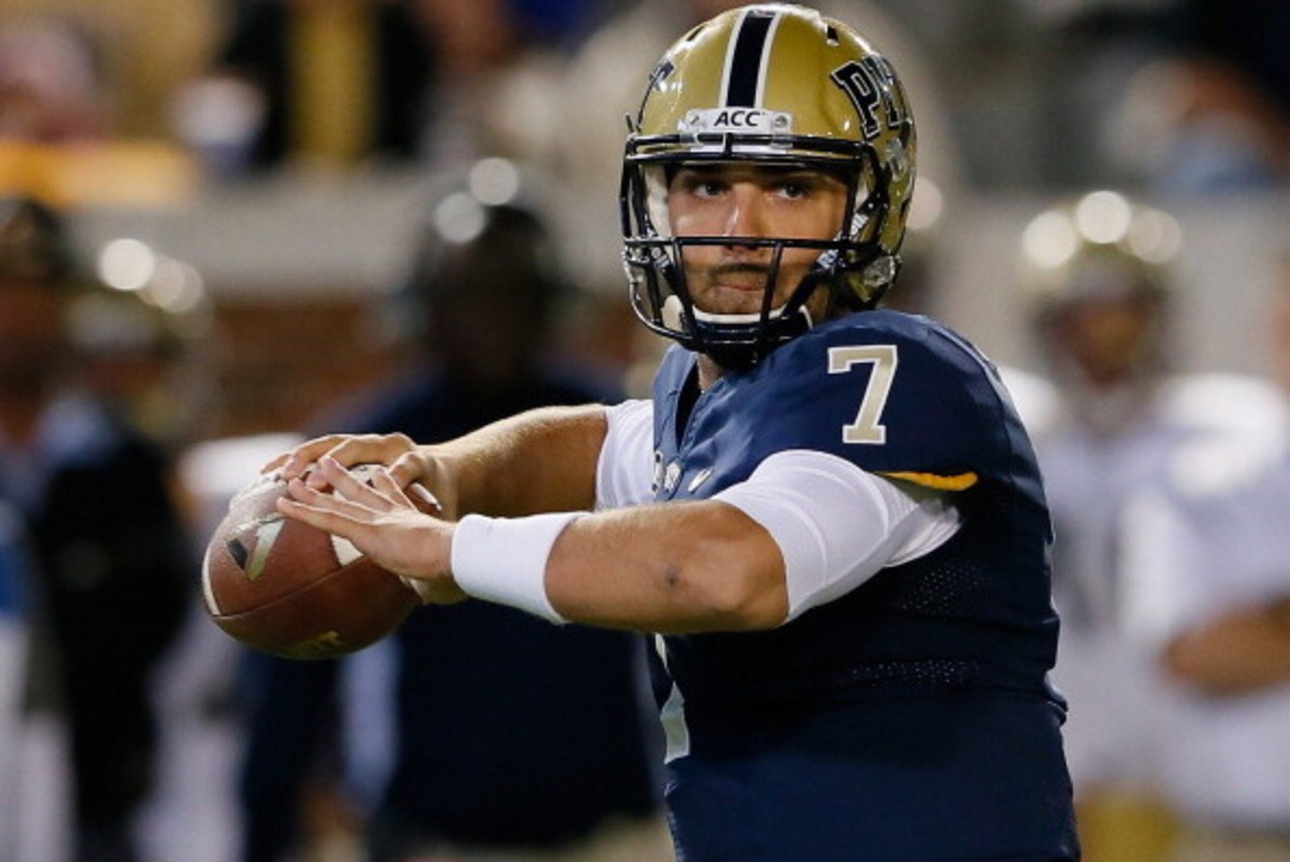 ATLANTA, GA - NOVEMBER 02:  Tom Savage #7 of the Pittsburgh Panthers looks to pass against the Georgia Tech Yellow Jackets at Bobby Dodd Stadium on November 2, 2013 in Atlanta, Georgia.  (Photo by Kevin C. Cox/Getty Images)