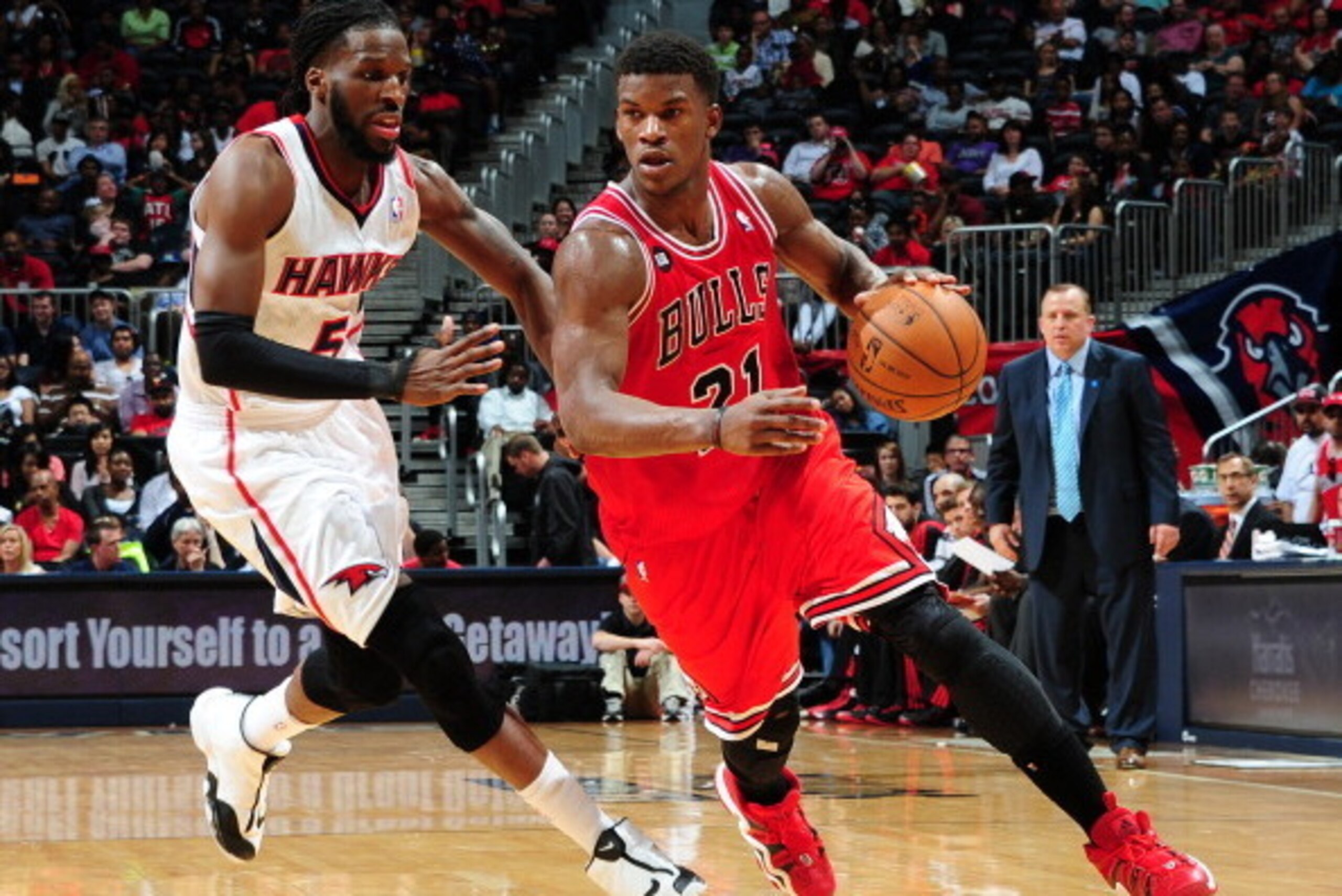 ATLANTA, GA - APRIL 2: Jimmy Butler #21 of the Chicago Bulls drives against the Atlanta Hawks on April 2, 2014 at Philips Arena in Atlanta, Georgia.  NOTE TO USER: User expressly acknowledges and agrees that, by downloading and/or using this Photograph, u
