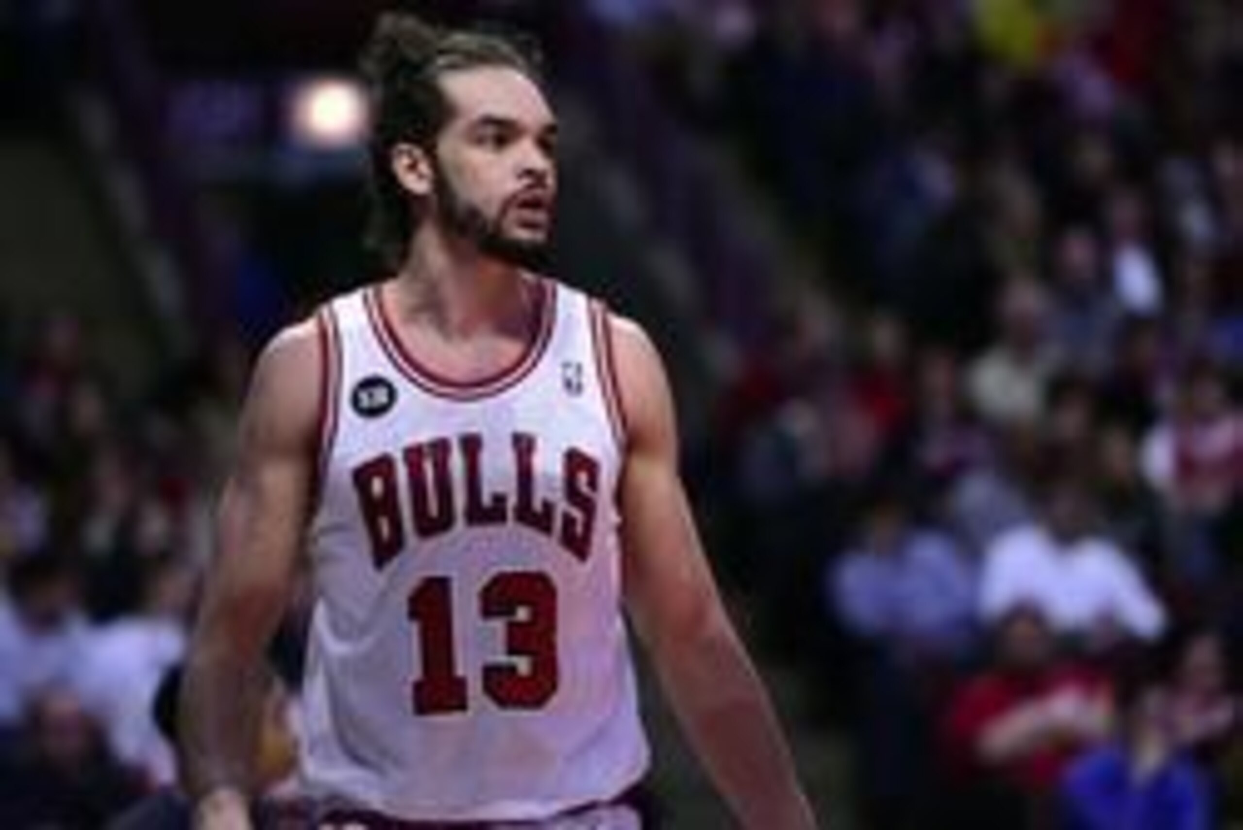 Apr 14, 2014; Chicago, IL, USA; Chicago Bulls center Joakim Noah (13) reacts to a jump ball during the second quarter of a game against the Orlando Magic at the United Center. Mandatory Credit: Mike DiNovo-USA TODAY Sports