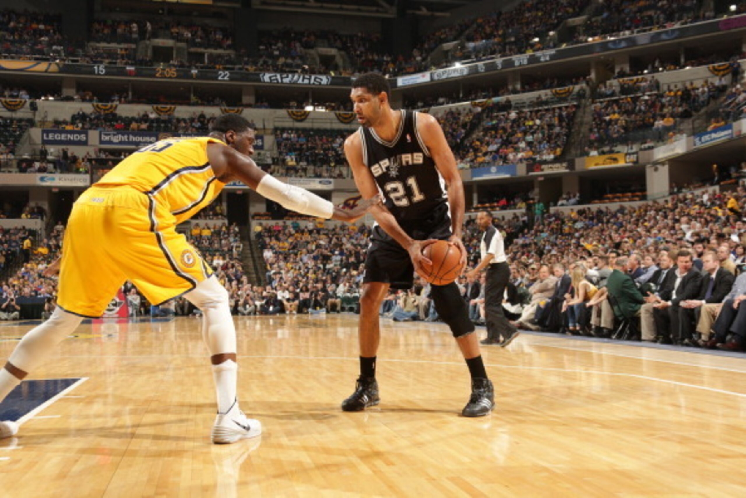 INDIANAPOLIS - MARCH 31: Tim Duncan #21 of the San Antonio Spurs controls the ball against the Indiana Pacers at Bankers Life Fieldhouse on March 31, 2014 in Indianapolis, Indiana.  NOTE TO USER: User expressly acknowledges and agrees that, by downloading