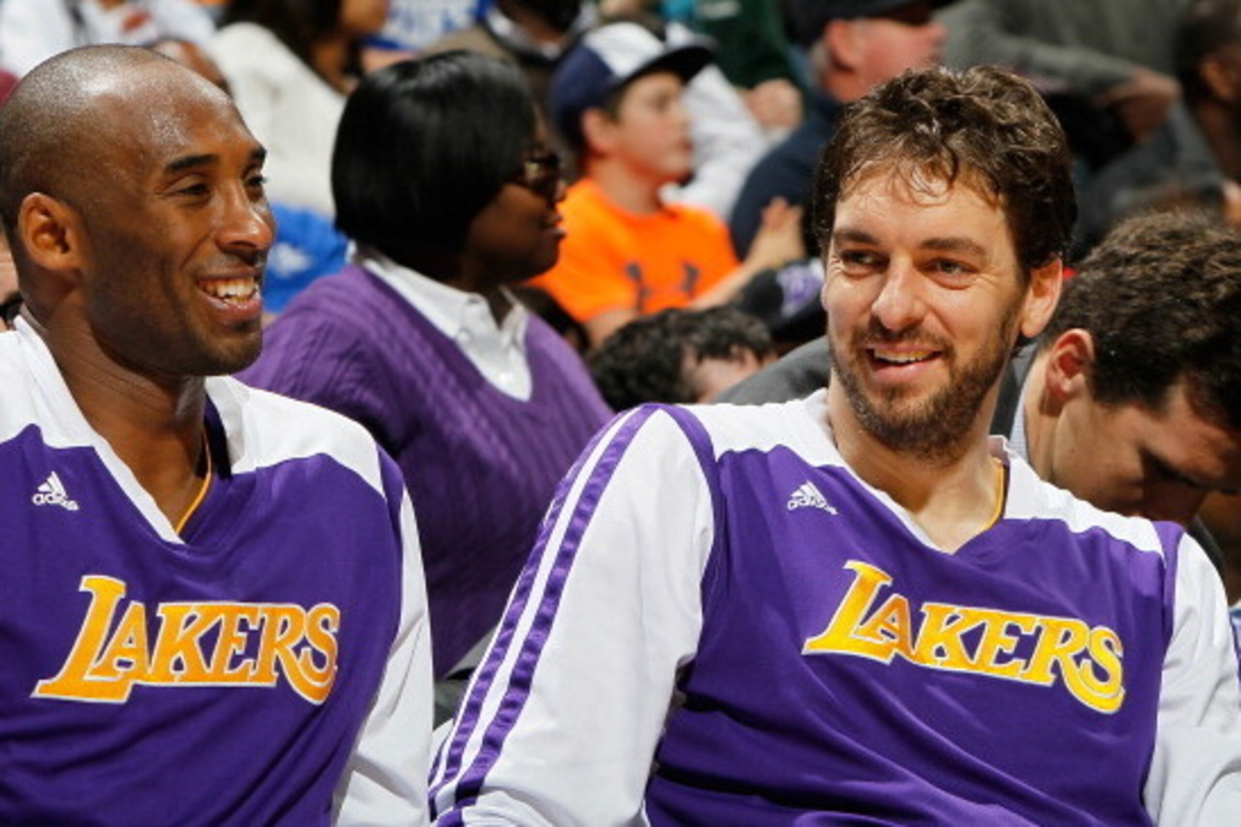 ATLANTA, GA - DECEMBER 16:  Kobe Bryant #24 and Pau Gasol #16 of the Los Angeles Lakers enjoy a laugh during the first half against the Atlanta Hawks at Philips Arena on December 16, 2013 in Atlanta, Georgia.  NOTE TO USER: User expressly acknowledges and