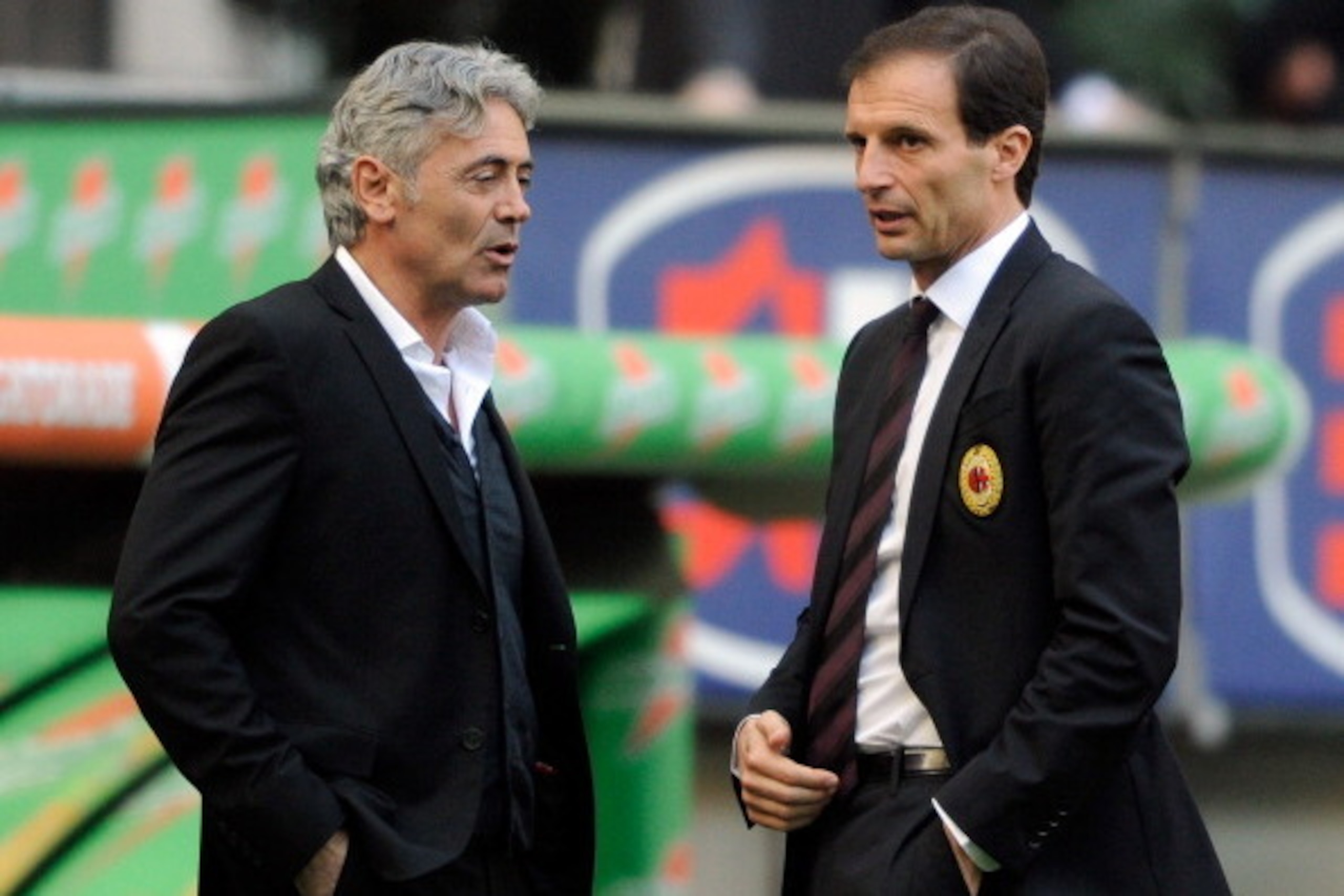 MILAN, ITALY - MARCH 24:  Franco Baldini AS Roma director general and AC Milan head coach Massimiliano Allegri (R) talk before the Serie A match between AC Milan and AS Roma at Stadio Giuseppe Meazza on March 24, 2012 in Milan, Italy.  (Photo by Claudio V