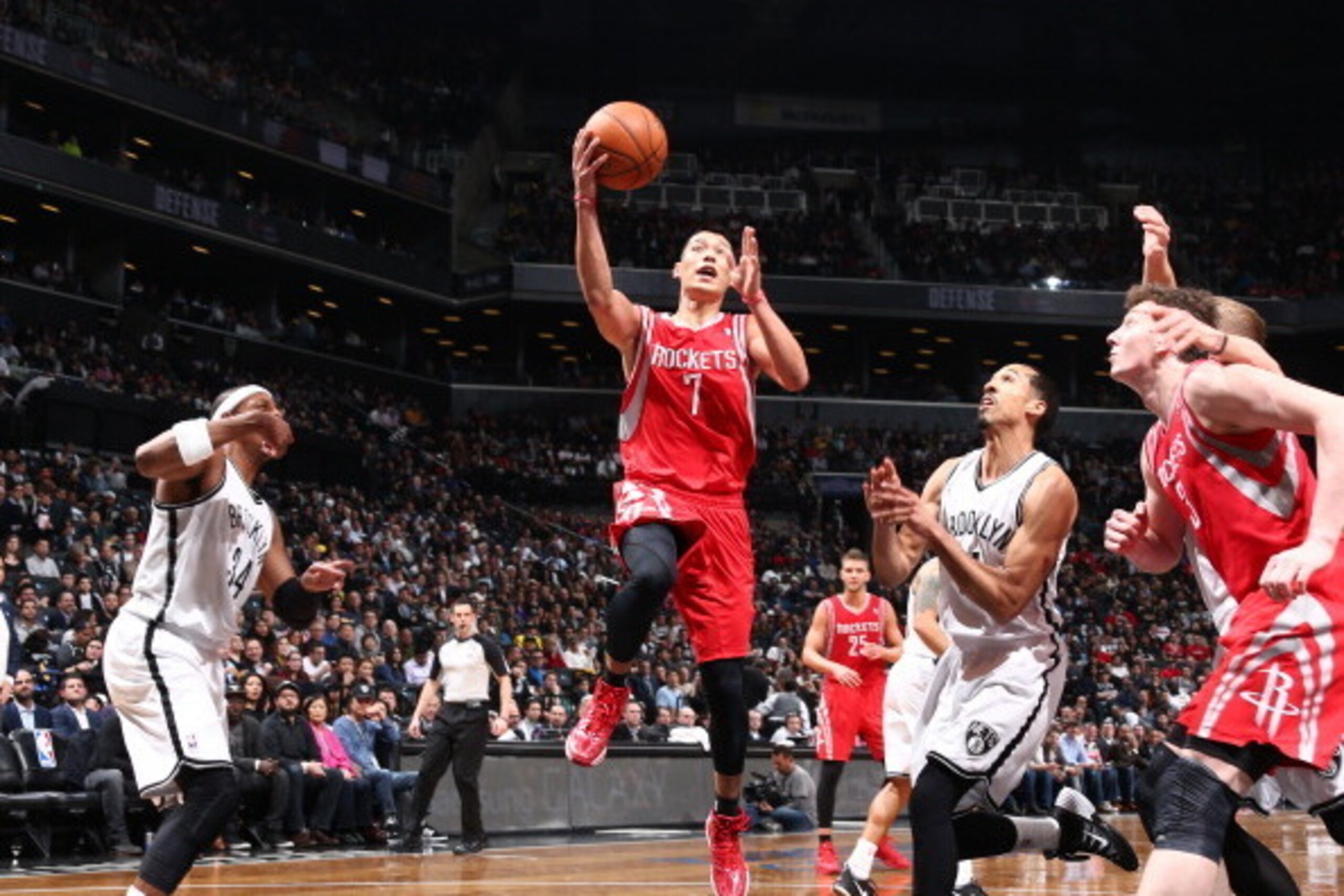 BROOKLYN, NY - April 01: Jeremy Lin #7 of the Houston Rockets shoots during a game against the Brooklyn Nets at the Barclays Center on April 01, 2014 in the Brooklyn borough of New York City.  NOTE TO USER: User expressly acknowledges and agrees that, by 