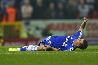 SWINDON, ENGLAND - SEPTEMBER 24:  Marco van Ginkel of Chelsea lies in pain after a challenge lead the midfielder to suffer a torn anterior cruciate ligament during the Capital One Cup third round match between Swindon Town and Chelsea at the County Ground