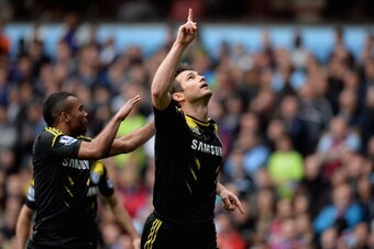 BIRMINGHAM, ENGLAND - MAY 11:  Frank Lampard of Chelsea celebrates scoring his team's first goal with Ashley Cole during Barclays Premier League match between Aston Villa and Chelsea at Villa Park on May 11, 2013 in Birmingham, England.  (Photo by Gareth 