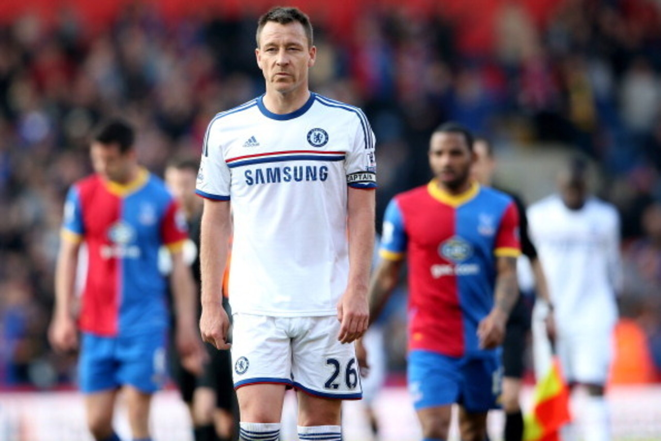 LONDON, ENGLAND - MARCH 29:  A dejected John Terry of Chelsea walks off the pitch following his team's 1-0 defeat during the Barclays Premier League match between Crystal Palace and Chelsea at Selhurst Park on March 29, 2014 in London, England.  (Photo by