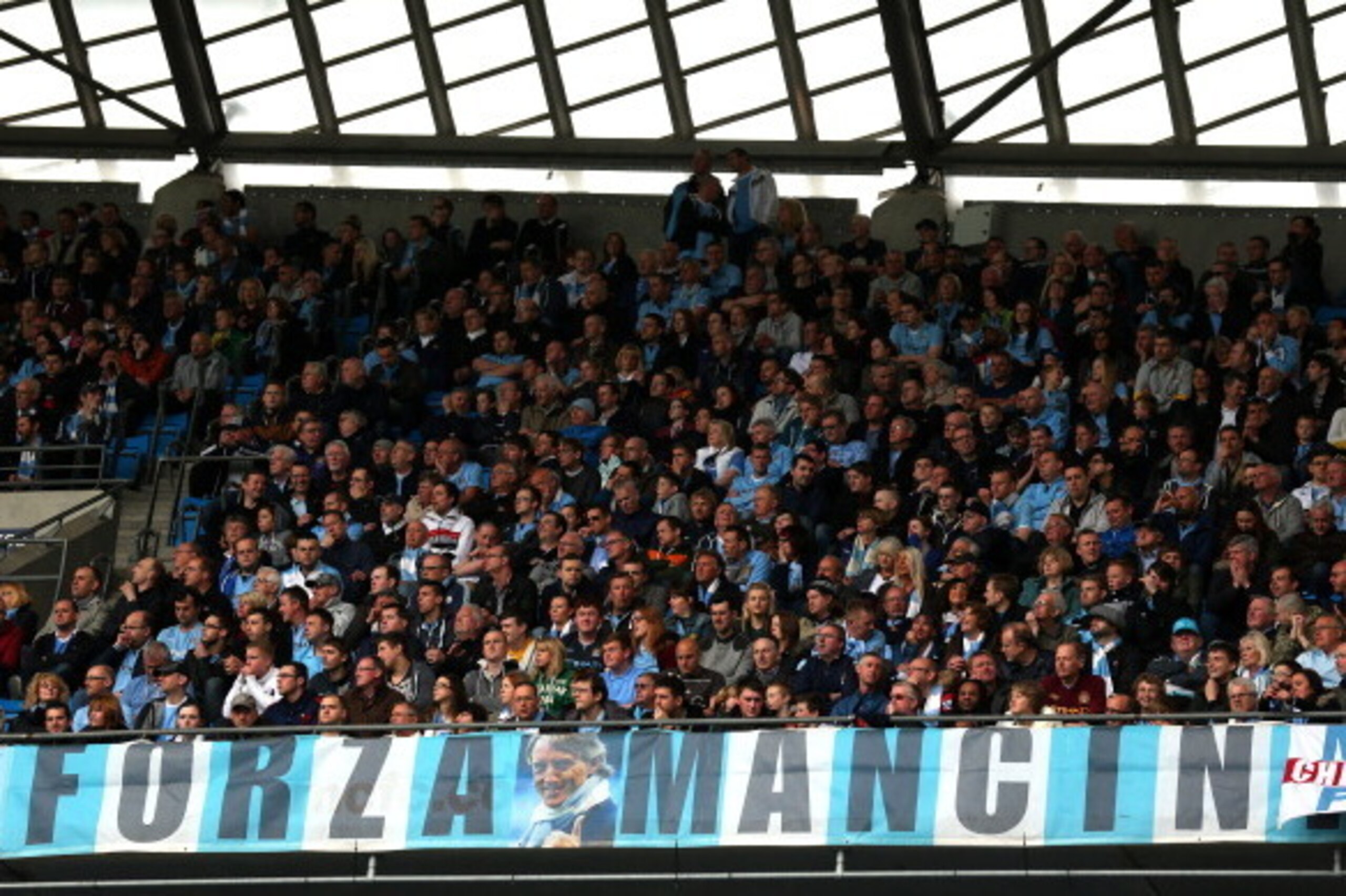 MANCHESTER, ENGLAND - MAY 19:  Manchester City fans show their support for Roberto Mancini the former manager of Manchester City during the Barclays Premier League match between Manchester City and Norwich City at Etihad Stadium on May 19, 2013 in Manches