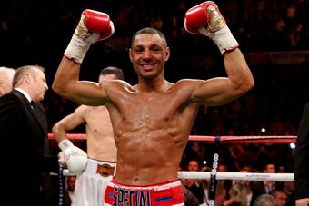 SHEFFIELD, ENGLAND - OCTOBER 26:  Kell Brook celebrates his victory over Vyacheslav Senchenko during their Final Eliminator for the IBF World Welterweight Championship bout at Motorpoint Arena on October 26, 2013 in Sheffield, England.  (Photo by Scott He