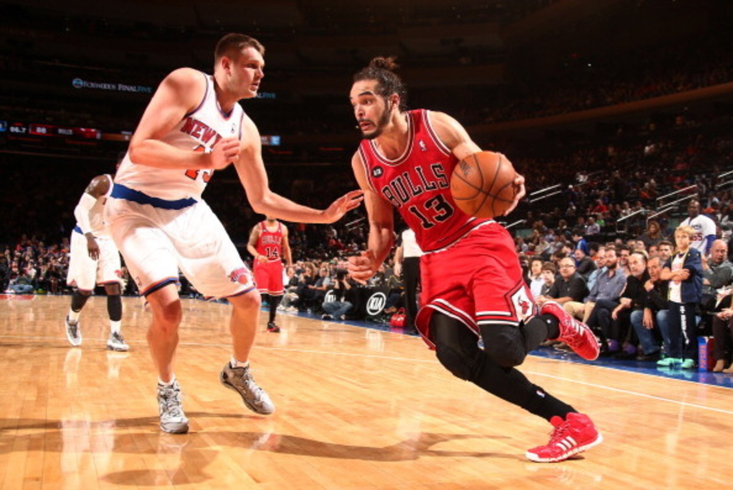 NEW YORK, NY - APRIL 13: Joakim Noah #13 of the Chicago Bulls drives against the New York Knicks during a game at Madison Square Garden in New York City on April 13, 2014.  NOTE TO USER: User expressly acknowledges and agrees that, by downloading and or u