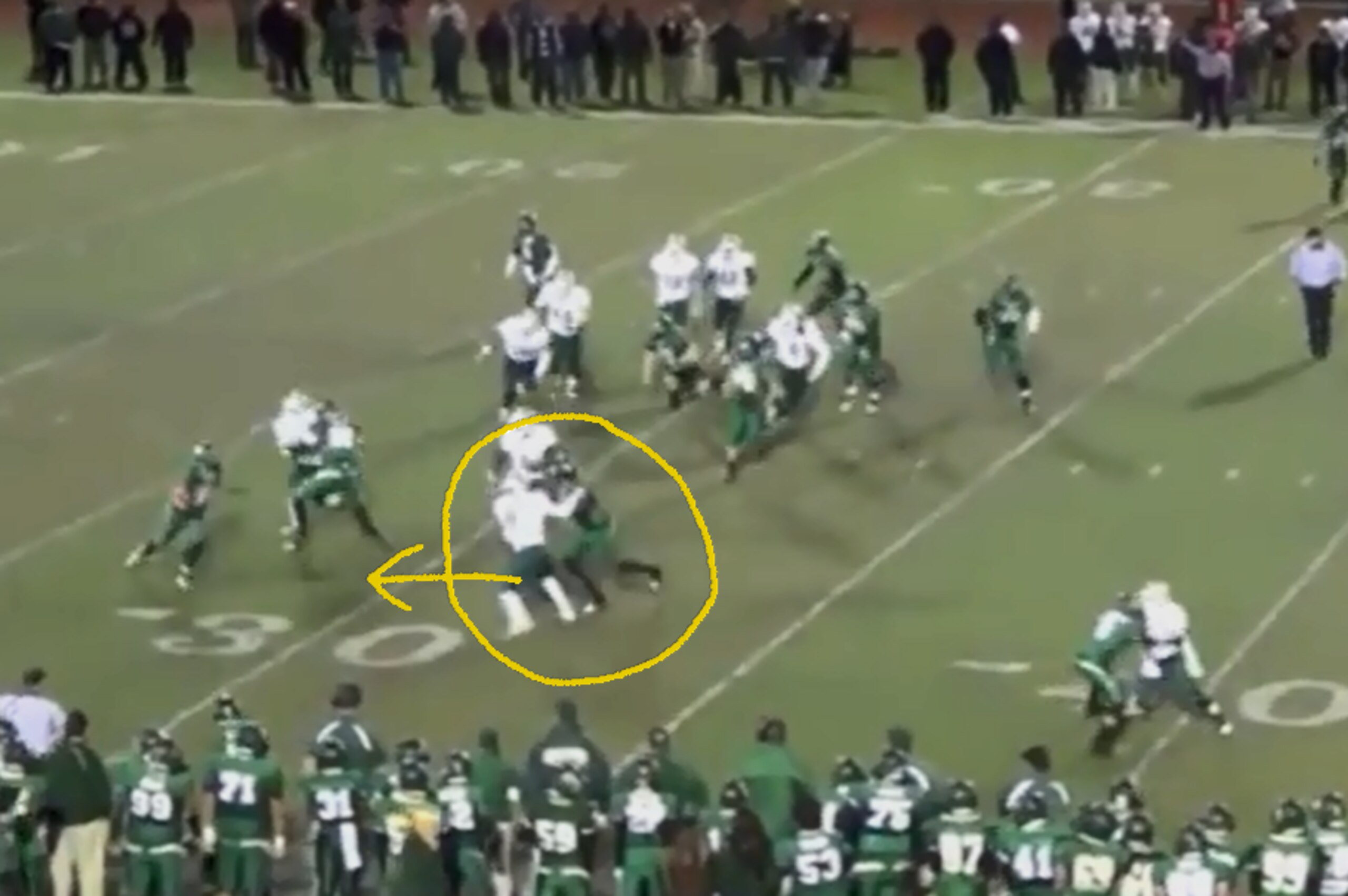 Marshall fights off blocks to make plays against the run.
