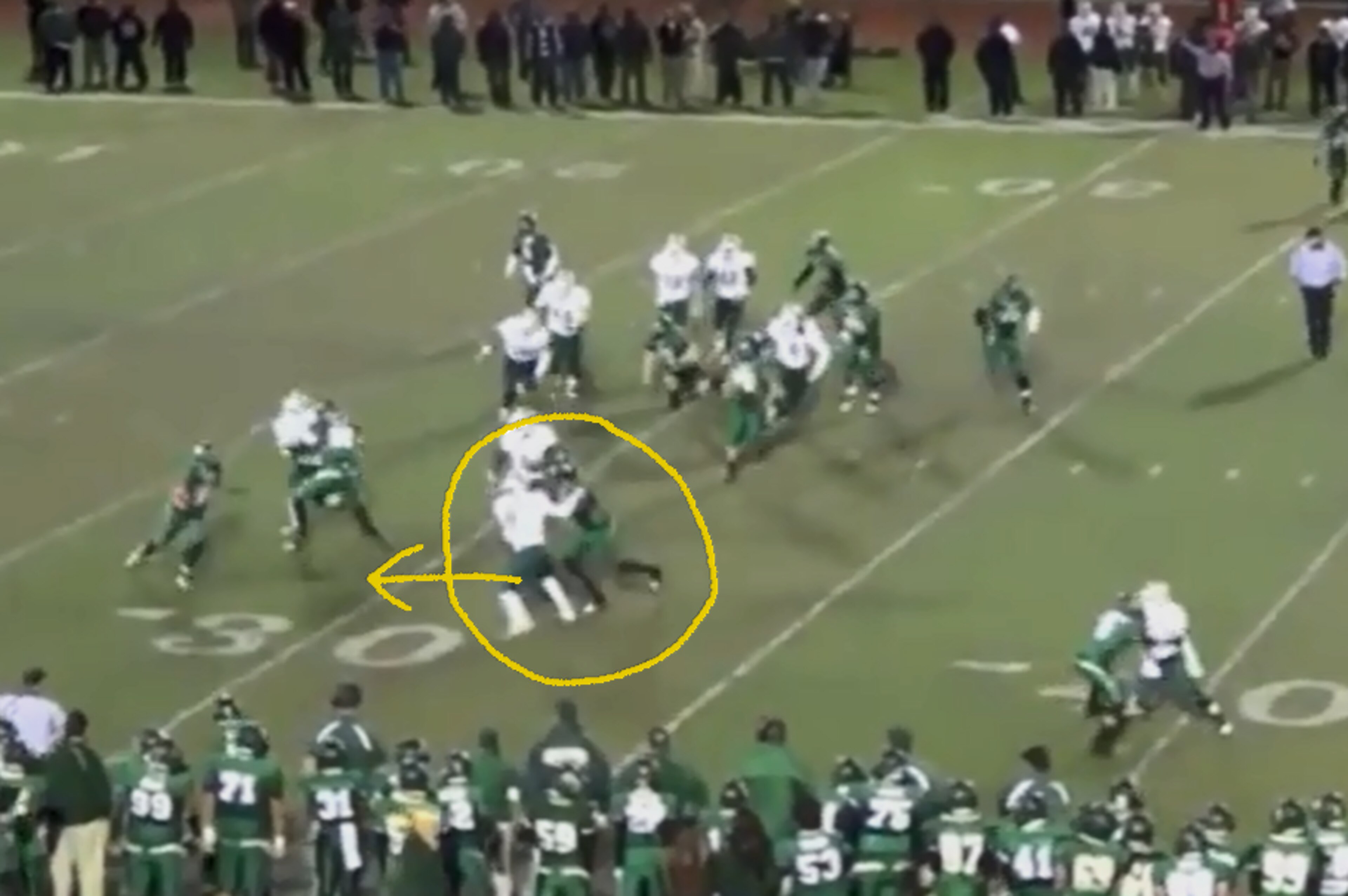 Marshall fights off blocks to make plays against the run.