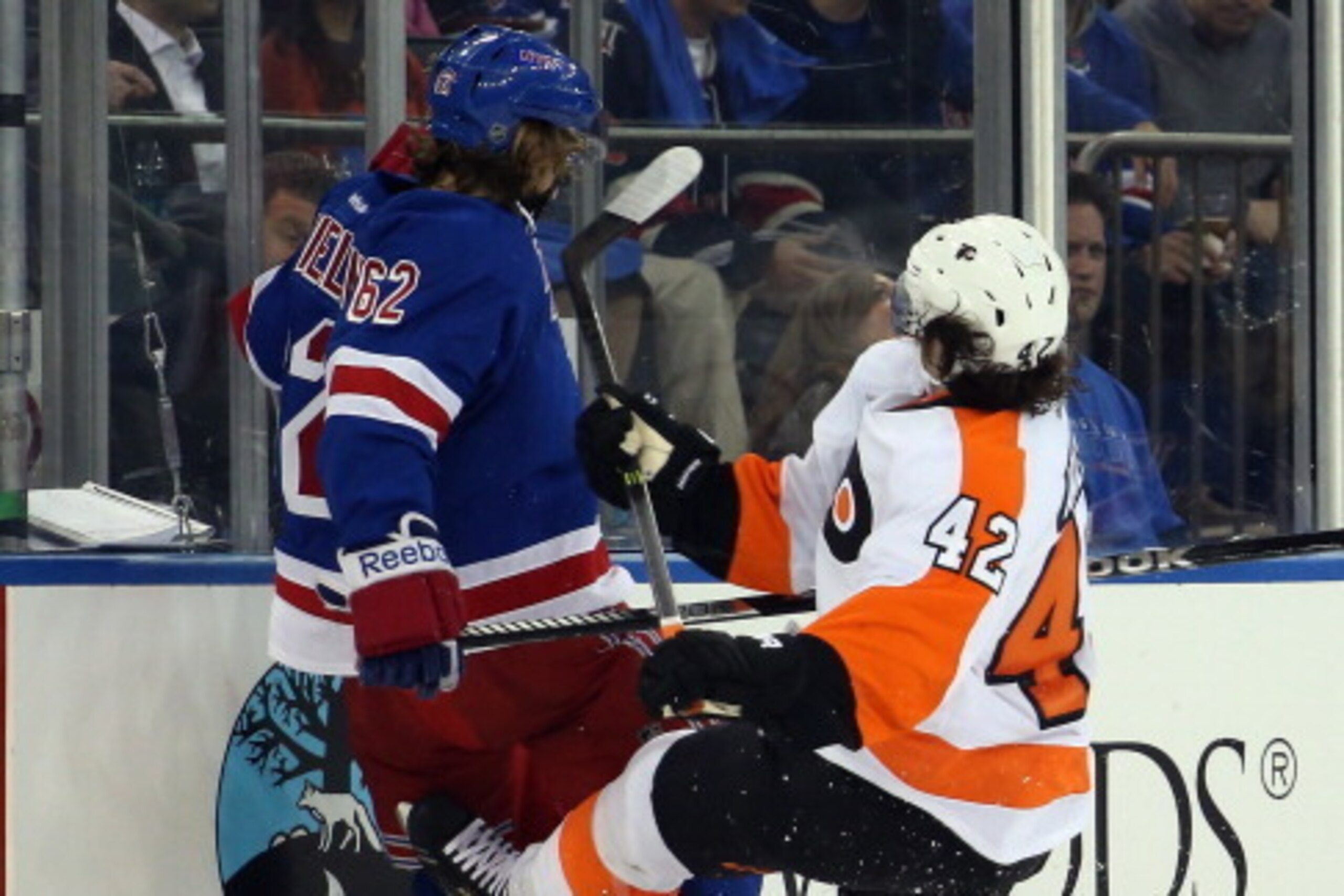 NEW YORK, NY - APRIL 17:  Jason Akeson #42 of the Philadelphia Flyers takes a four minute penalty for highsticking Carl Hagelin #62 of the New York Rangers in Game One of the First Round of the 2014 NHL Stanley Cup Playoffs at Madison Square Garden on Apr